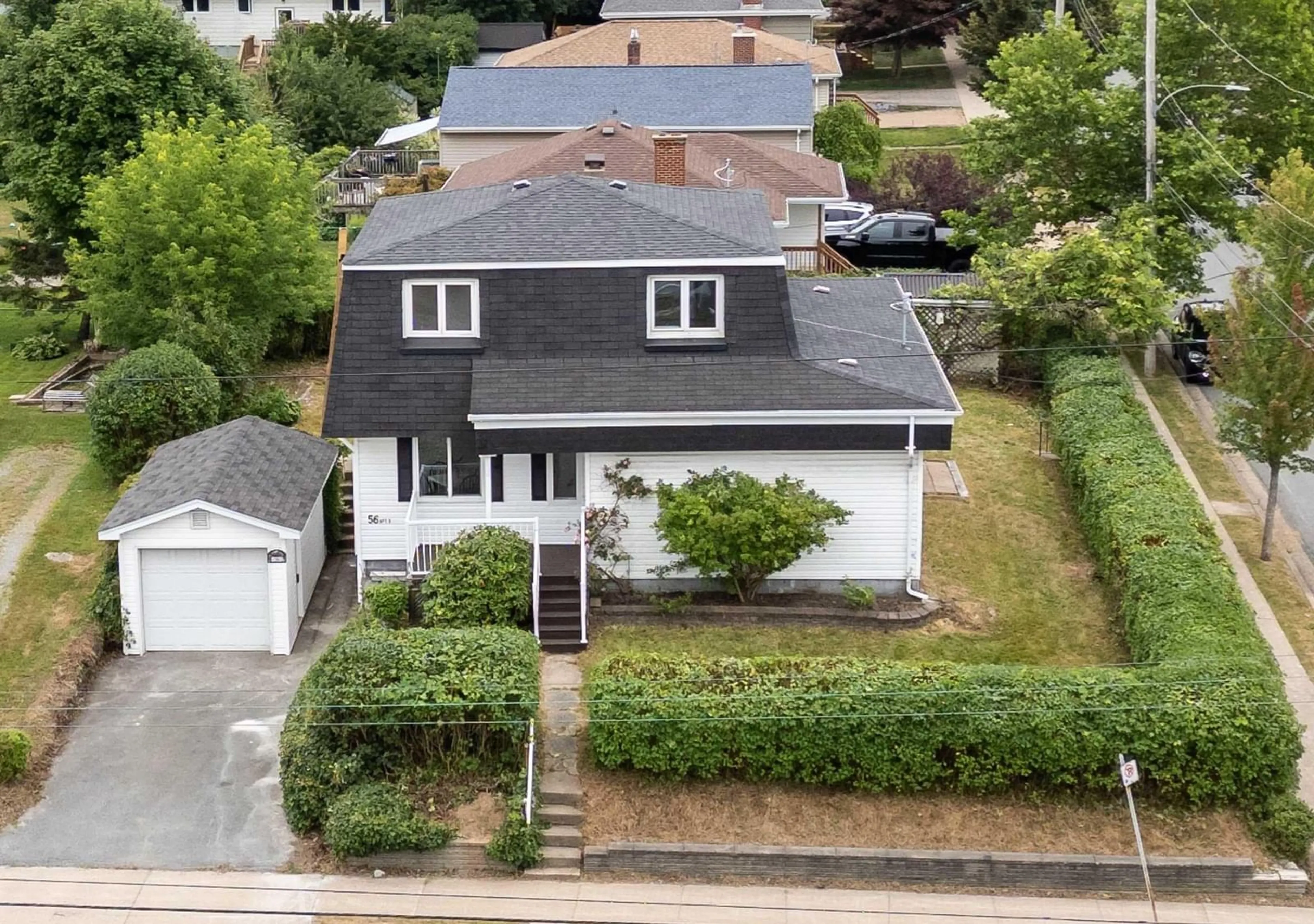 A pic from outside/outdoor area/front of a property/back of a property/a pic from drone, street for 56 Woodland Ave, Dartmouth Nova Scotia B3A 3K1