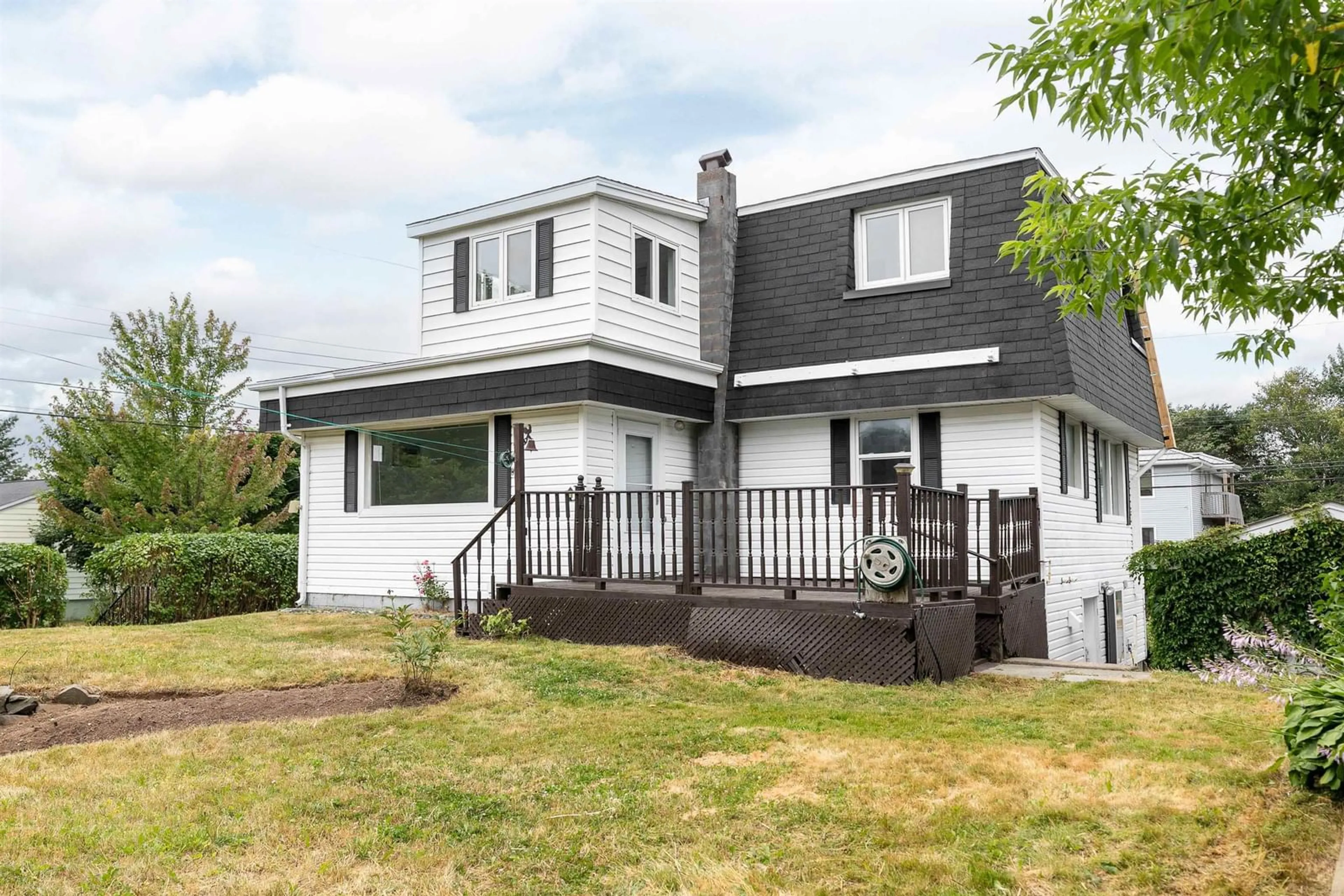 Home with vinyl exterior material, street for 56 Woodland Ave, Dartmouth Nova Scotia B3A 3K1
