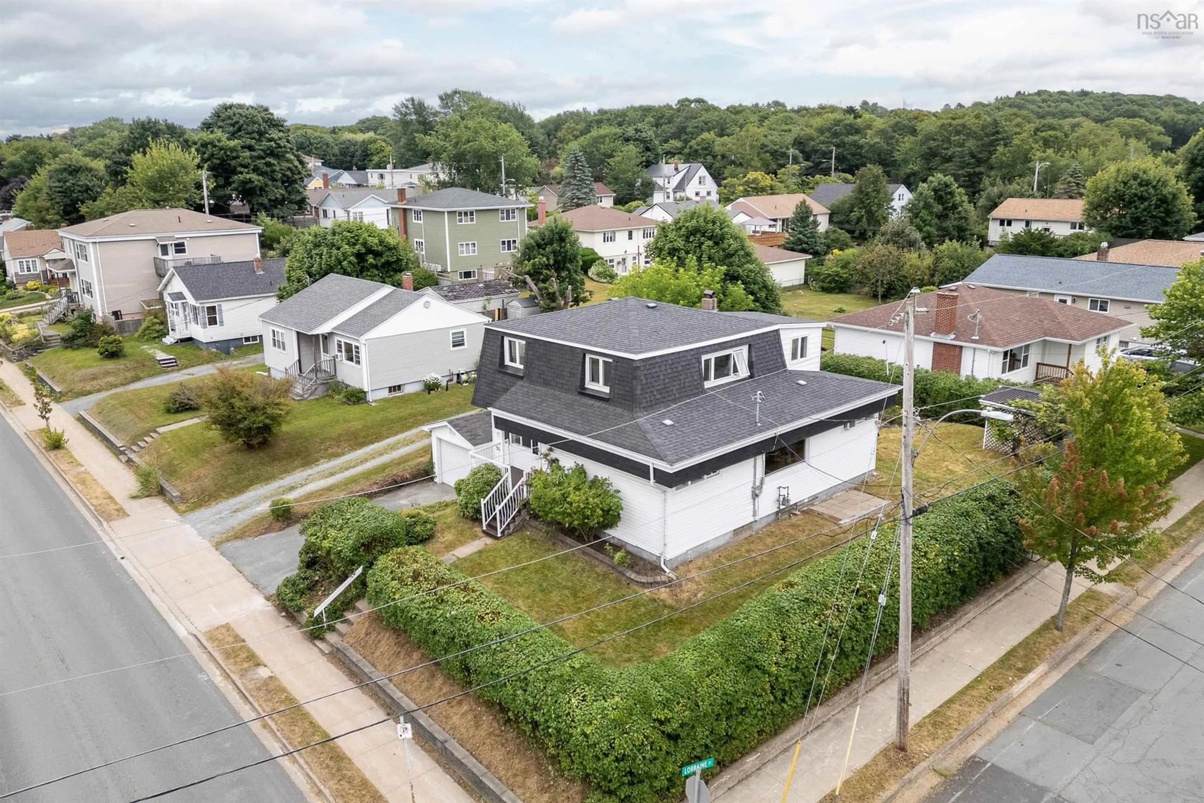 A pic from outside/outdoor area/front of a property/back of a property/a pic from drone, street for 56 Woodland Ave, Dartmouth Nova Scotia B3A 3K1