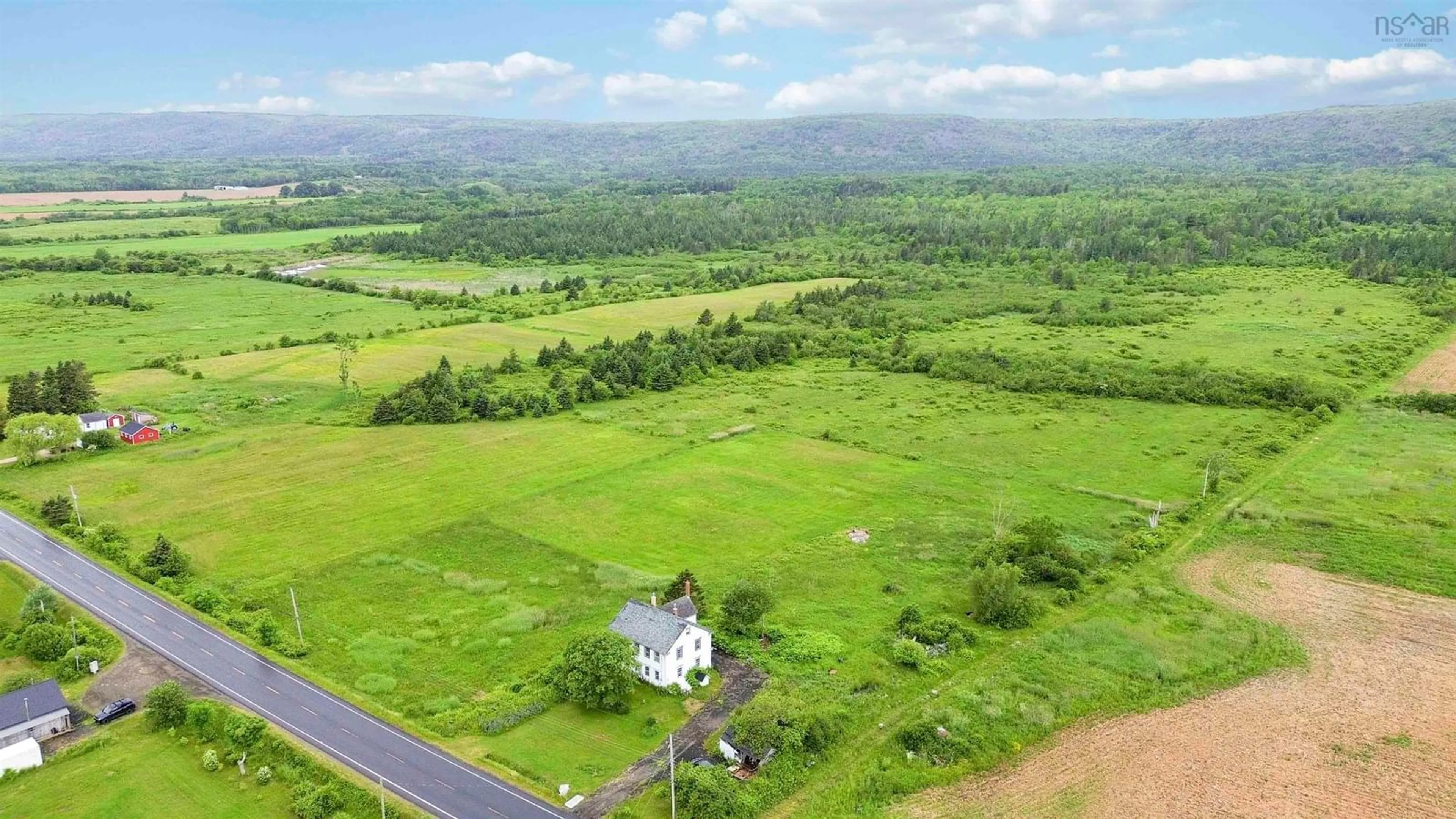 A pic from outside/outdoor area/front of a property/back of a property/a pic from drone, mountain view for 8045 Highway 1, Upper Granville Nova Scotia B0S 1A0