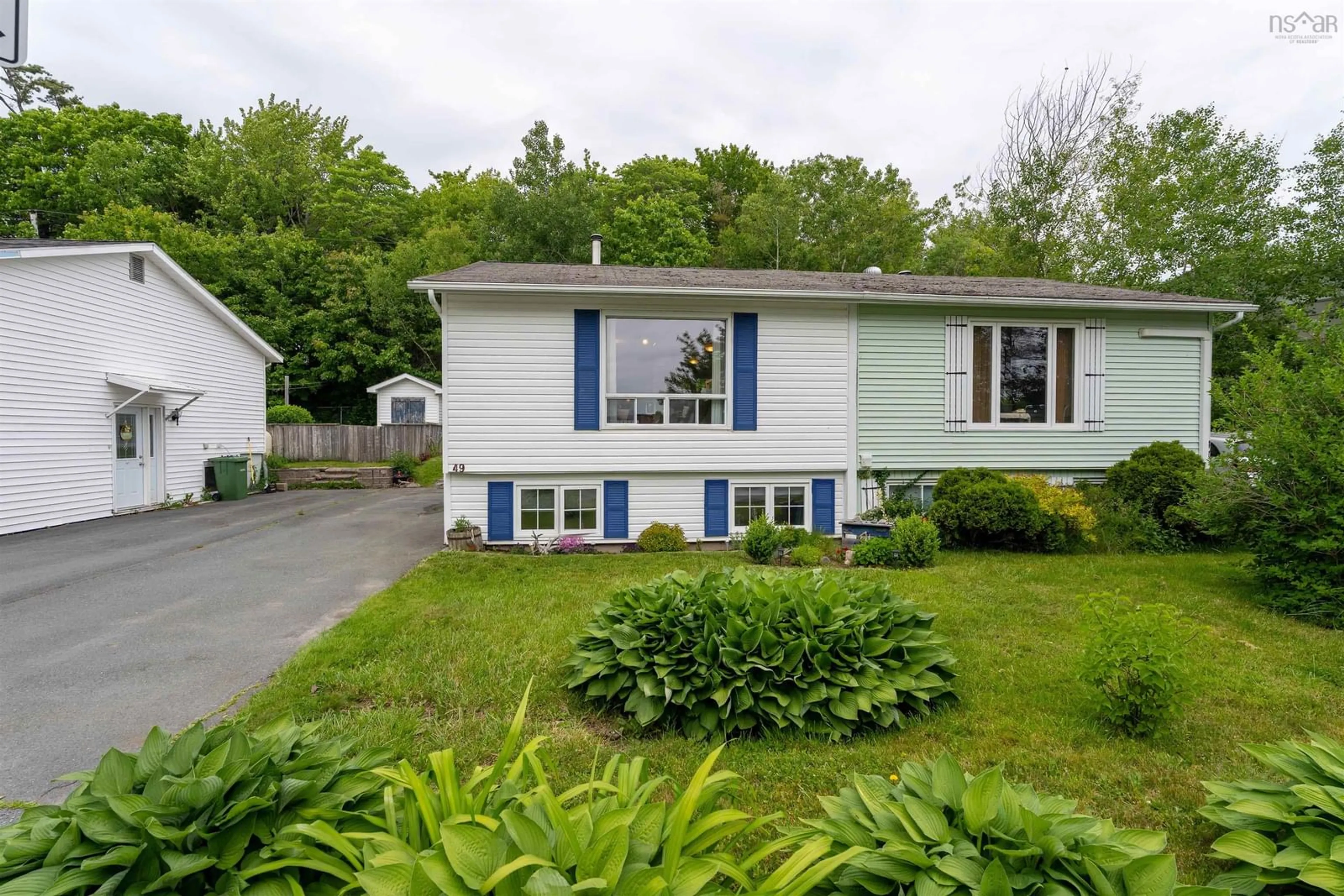 Home with vinyl exterior material, street for 49 Prince St, Lower Sackville Nova Scotia B4C 1L2