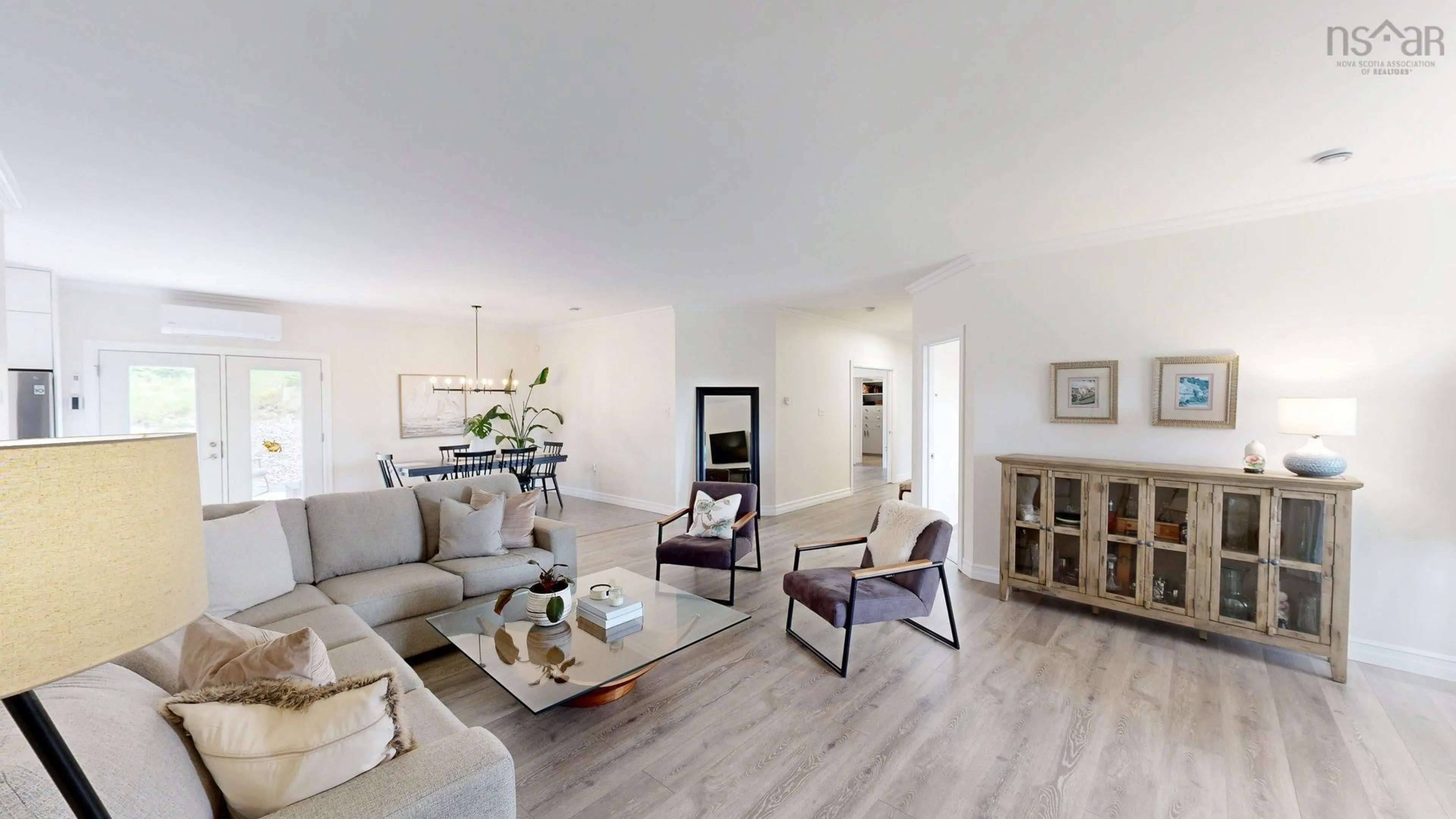 Living room with furniture, wood/laminate floor for 84 Oceanic Dr, East Lawrencetown Nova Scotia B2Z 1T6