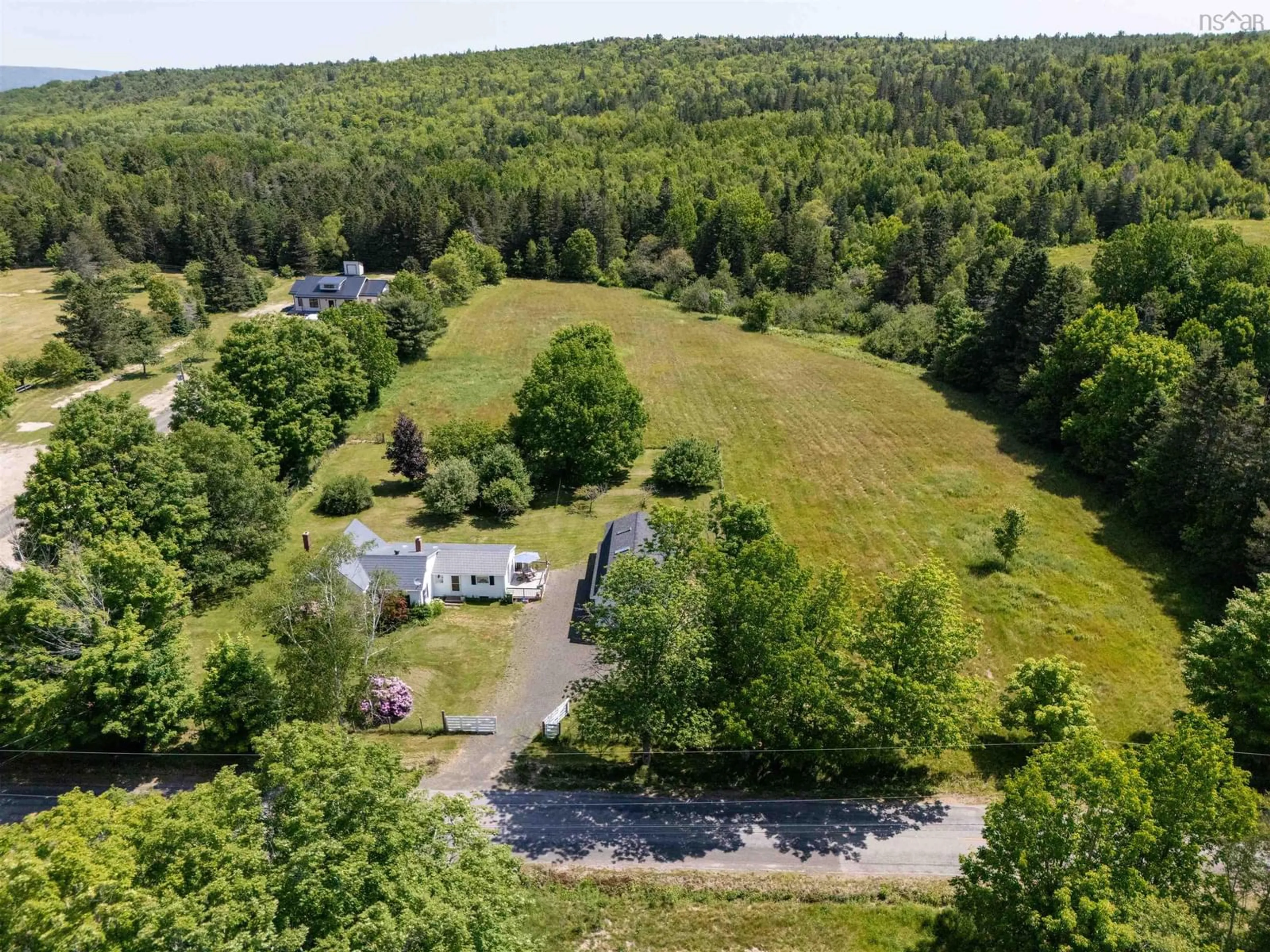 A pic from outside/outdoor area/front of a property/back of a property/a pic from drone, forest/trees view for 1546 Spurr Rd, Round Hill Nova Scotia B0S 1C0