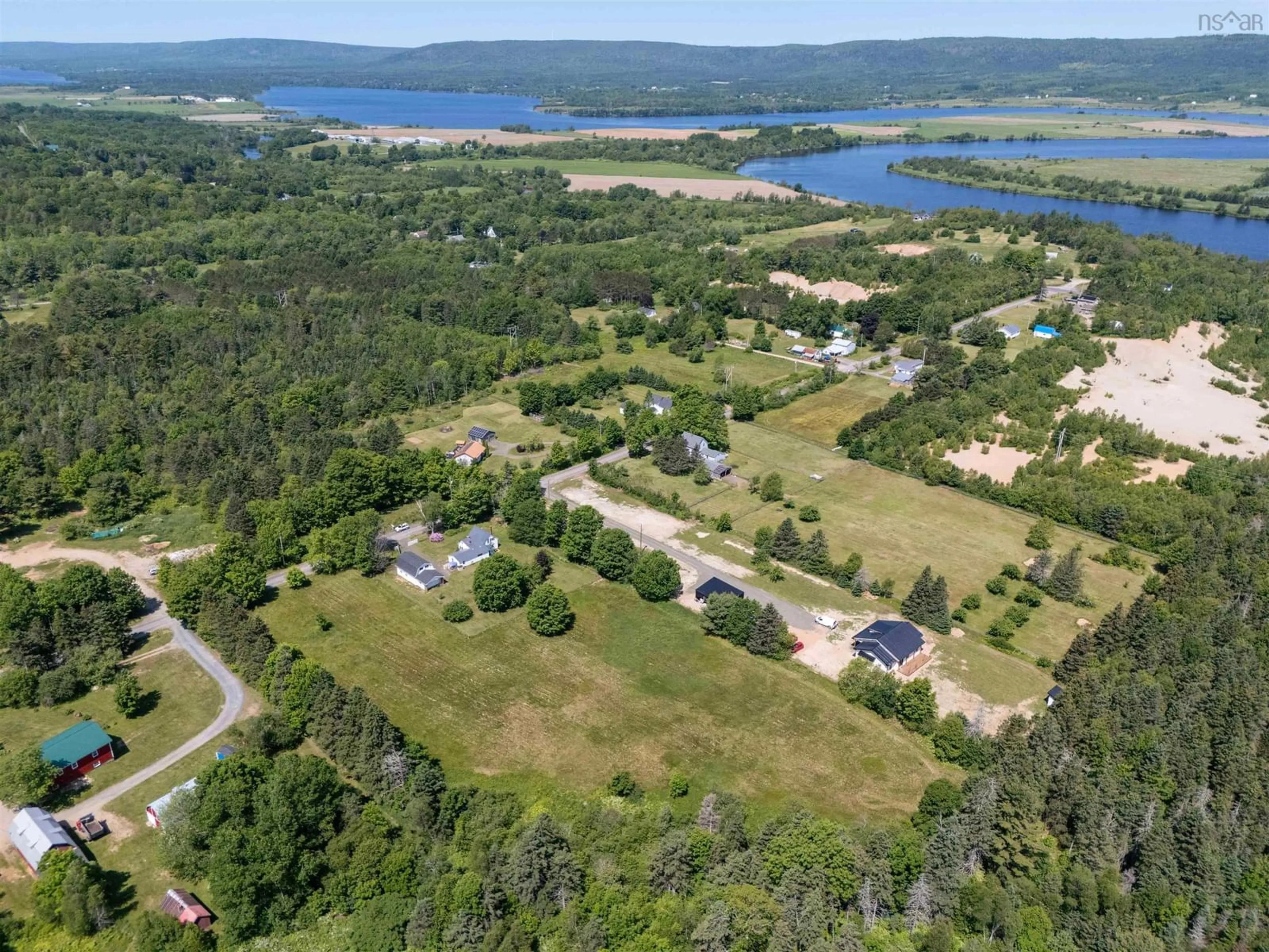 A pic from outside/outdoor area/front of a property/back of a property/a pic from drone, water/lake/river/ocean view for 1546 Spurr Rd, Round Hill Nova Scotia B0S 1C0