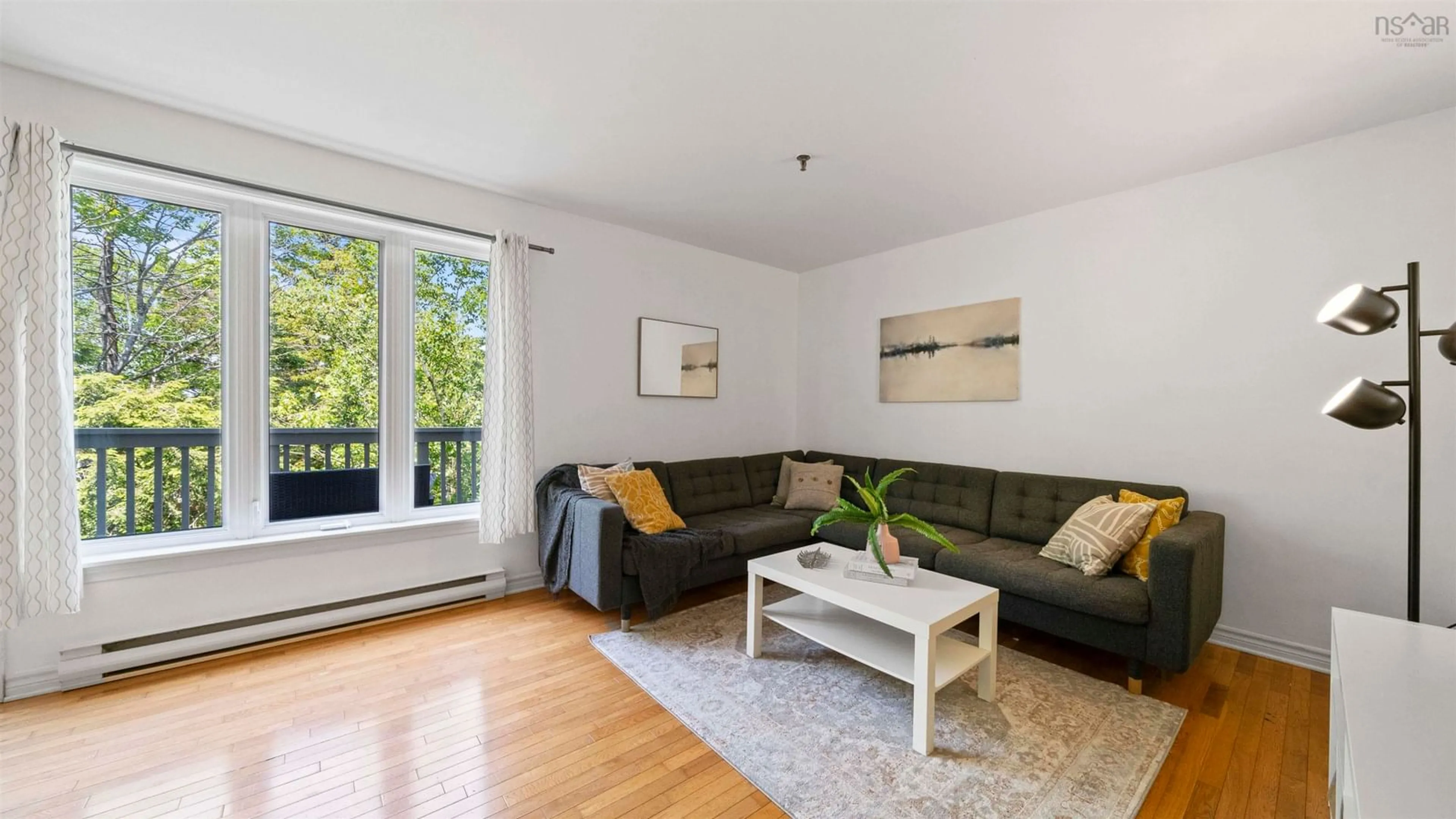 Living room with furniture, wood/laminate floor for 159 Farnham Gate #204, Clayton Park Nova Scotia B3M 4A3
