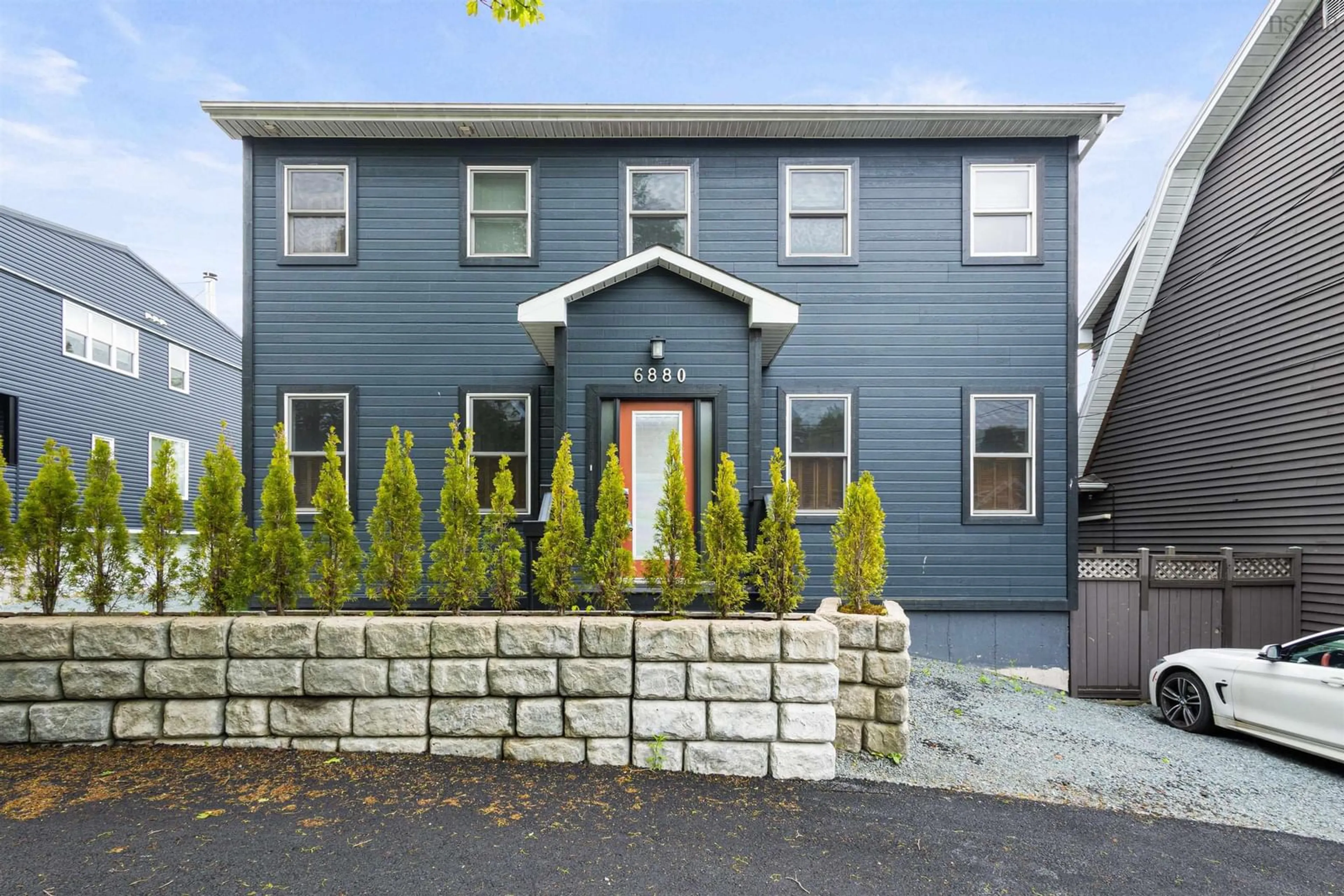 Home with vinyl exterior material, street for 6880 Quinpool Rd, Halifax Nova Scotia B3L 1C4