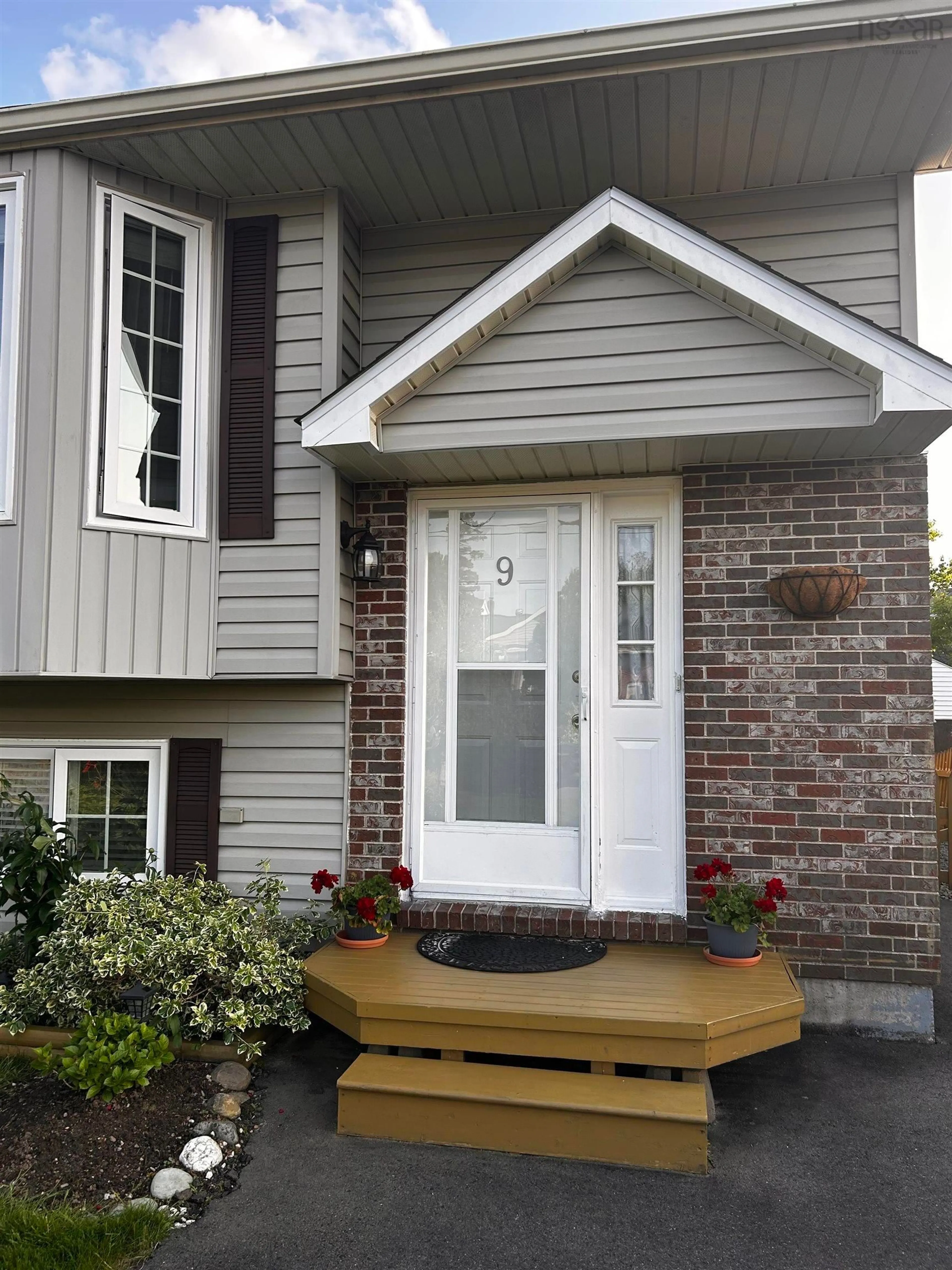 Home with vinyl exterior material, street for 9 Laurelcrest Dr #18B, Eastern Passage Nova Scotia B3G 1N3