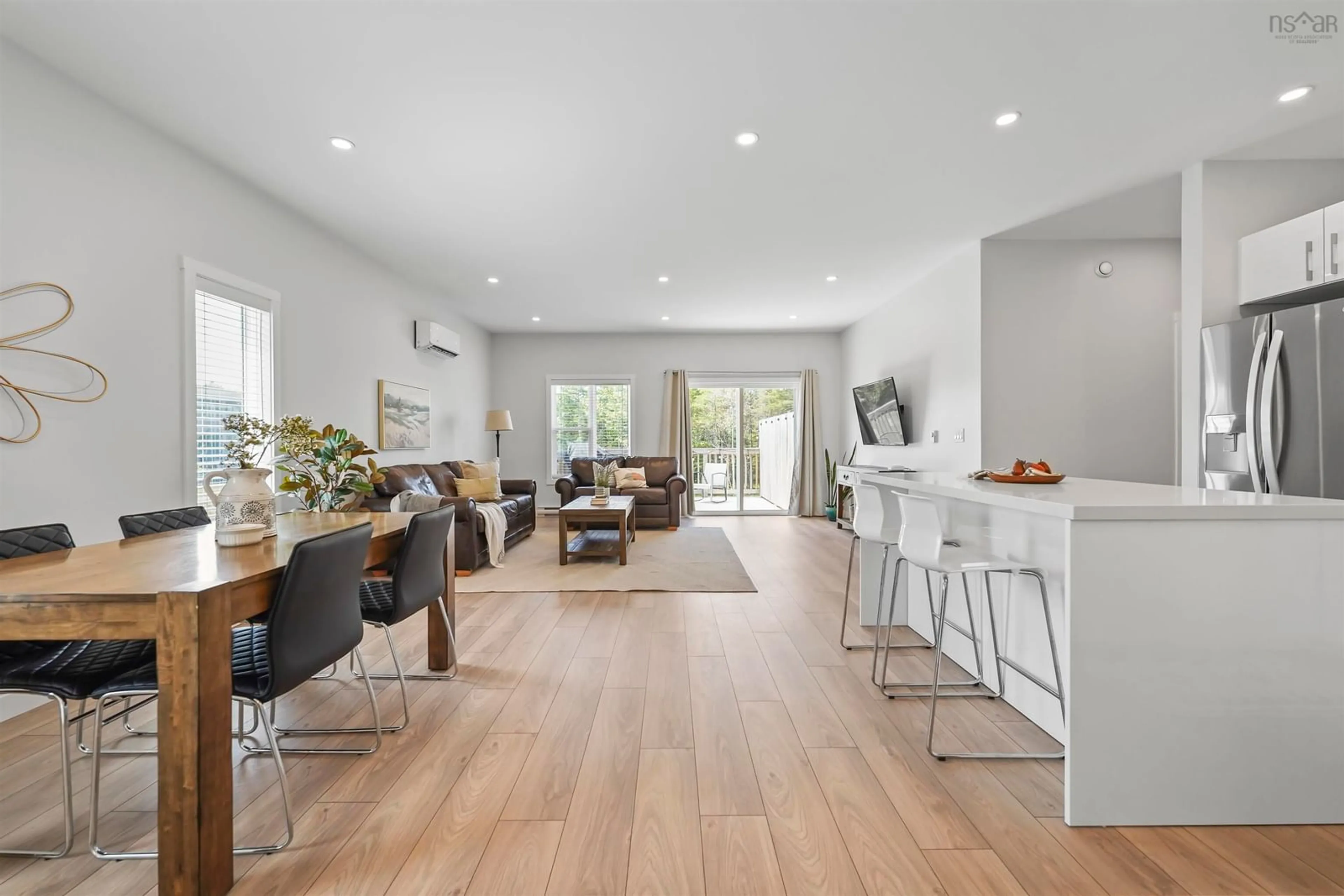 Open concept kitchen, wood/laminate floor for 12 Lew Cres, Lantz Nova Scotia B2S 0C3