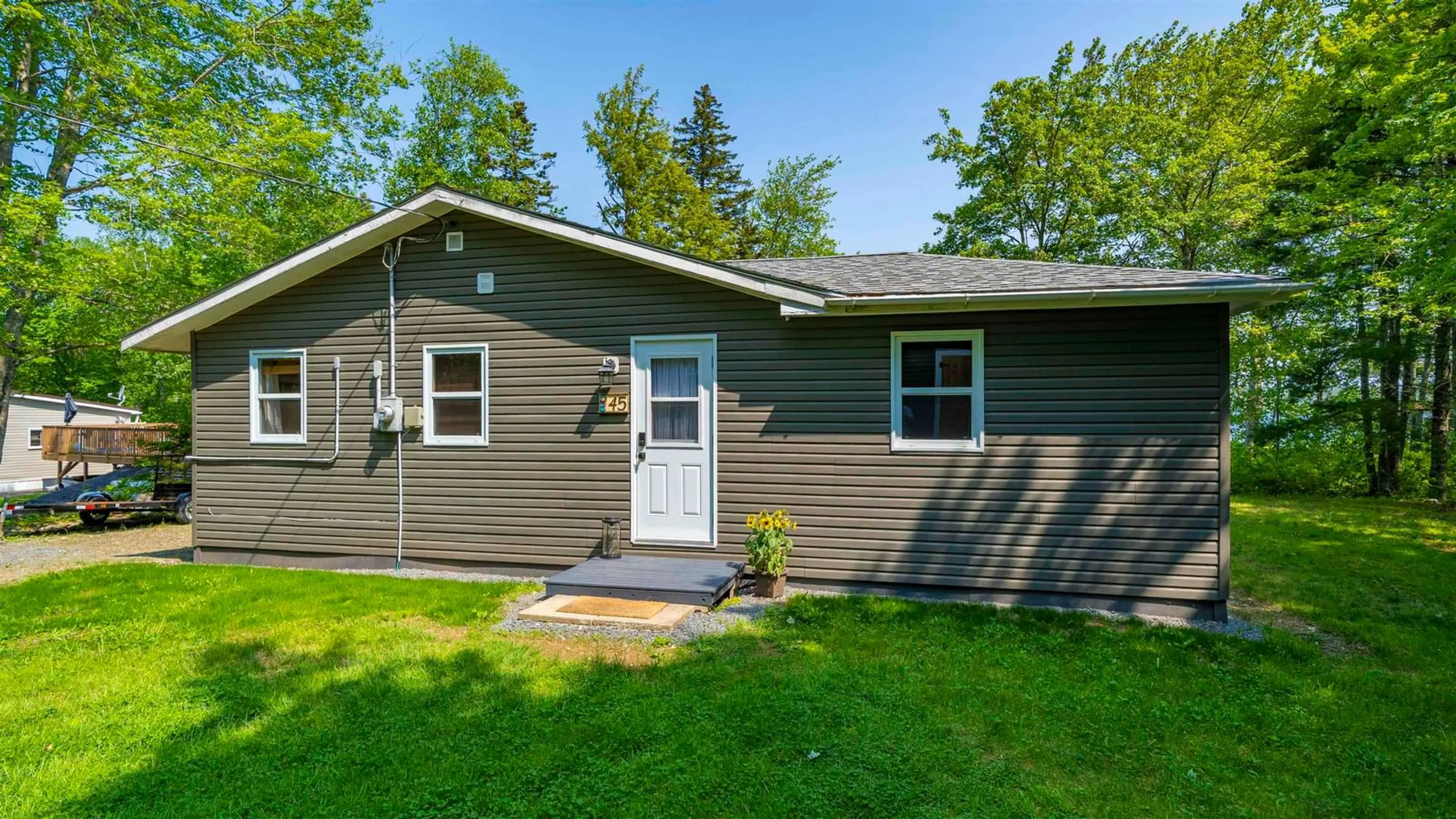 Home with vinyl exterior material, street for 45 Crooked Lake Rd, Camperdown Nova Scotia B4V 6T3