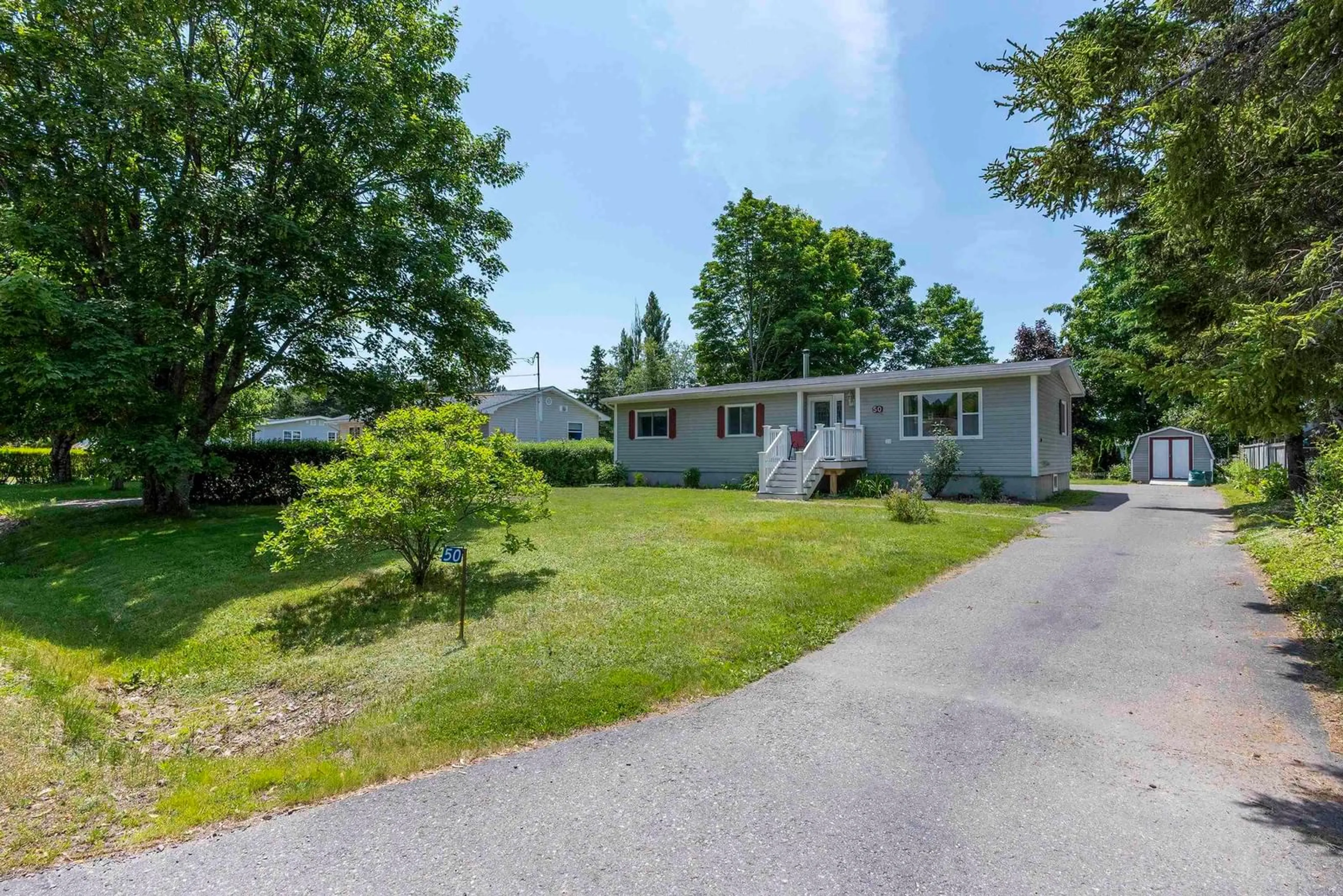 A pic from outside/outdoor area/front of a property/back of a property/a pic from drone, street for 50 Bishop Ave, New Minas Nova Scotia B4N 3N9