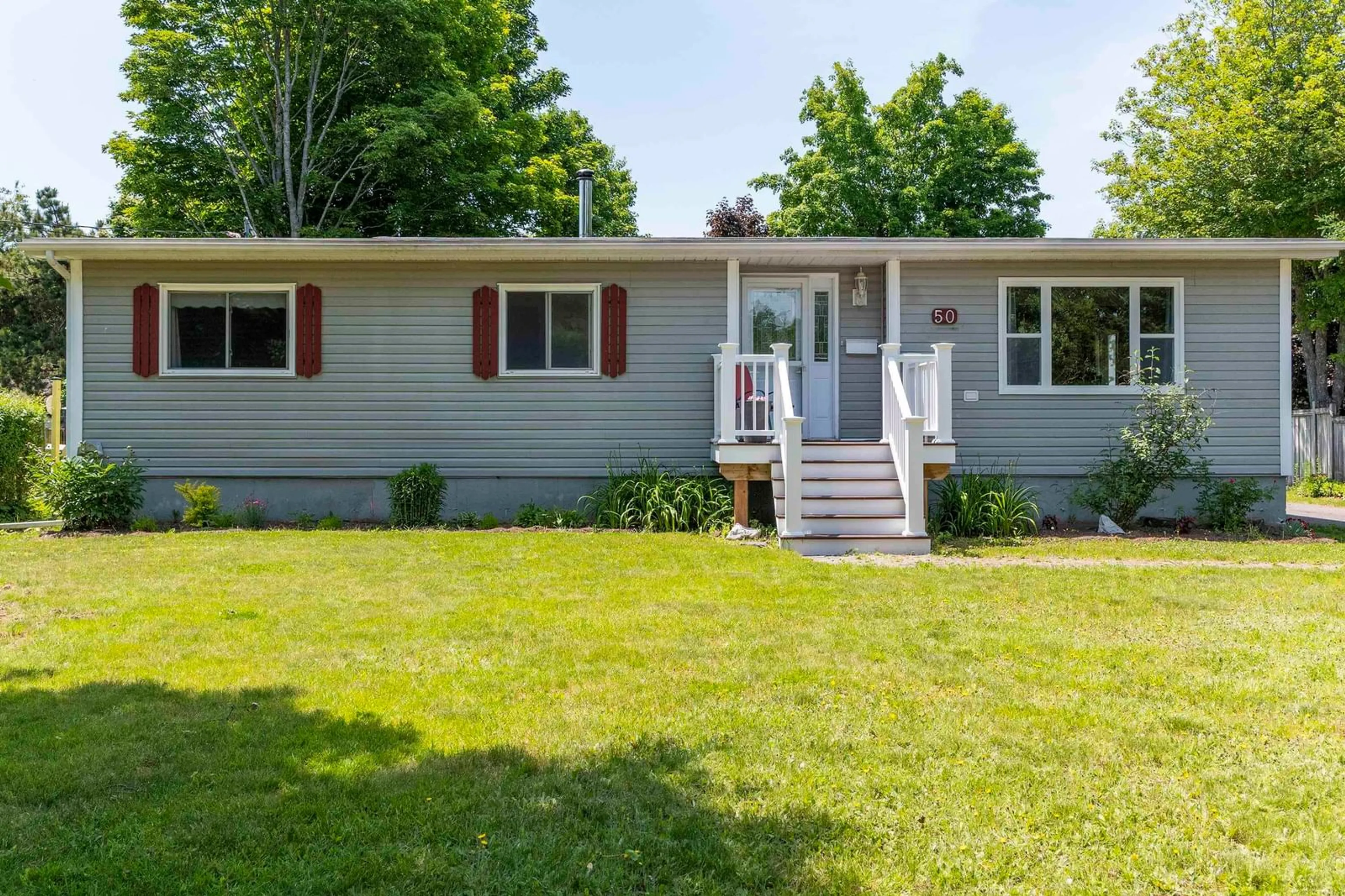 Home with vinyl exterior material, street for 50 Bishop Ave, New Minas Nova Scotia B4N 3N9