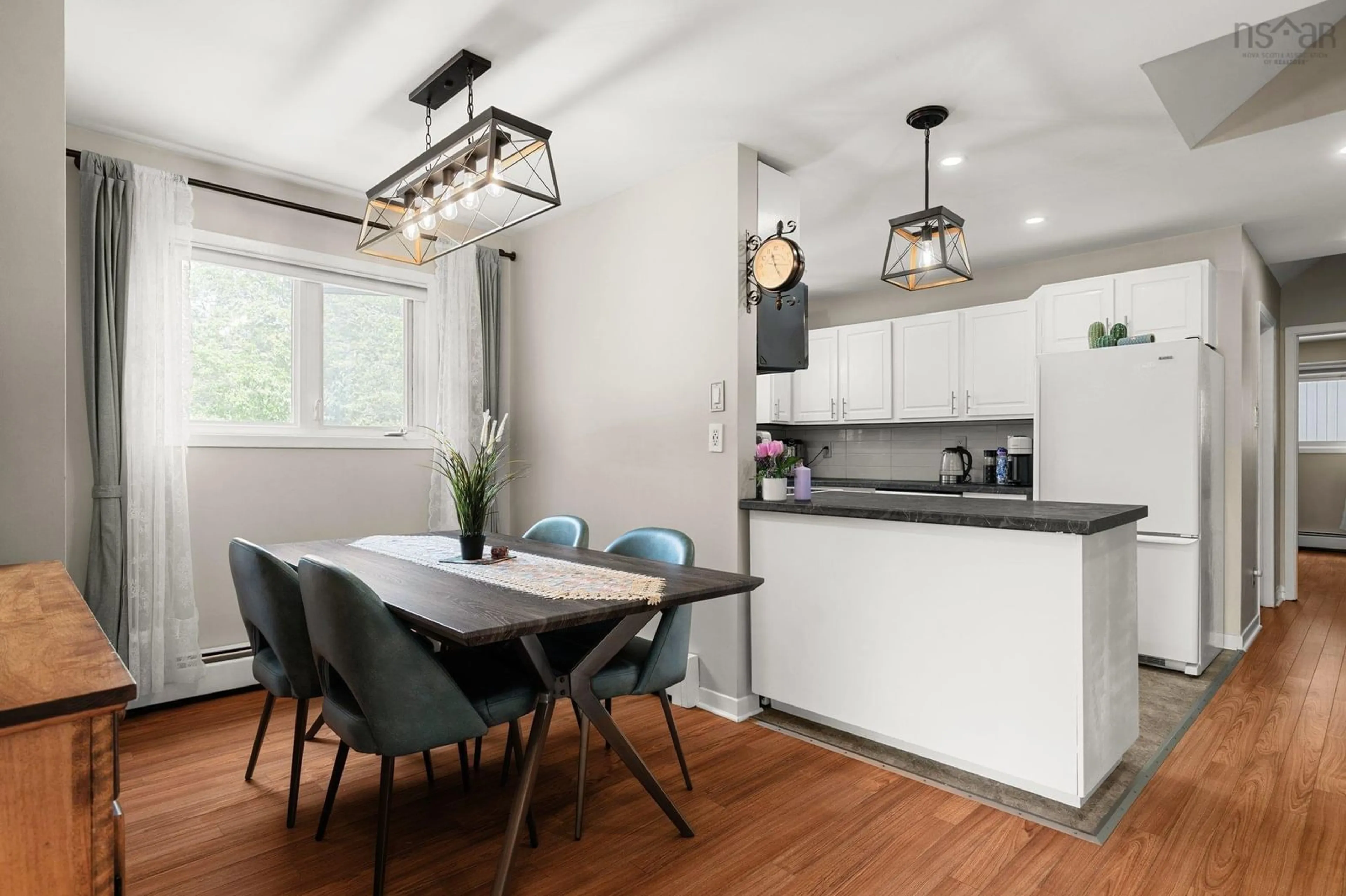 Open concept kitchen, wood/laminate floor for 77 Bedford Hills Rd, Bedford Nova Scotia B4A 1J8