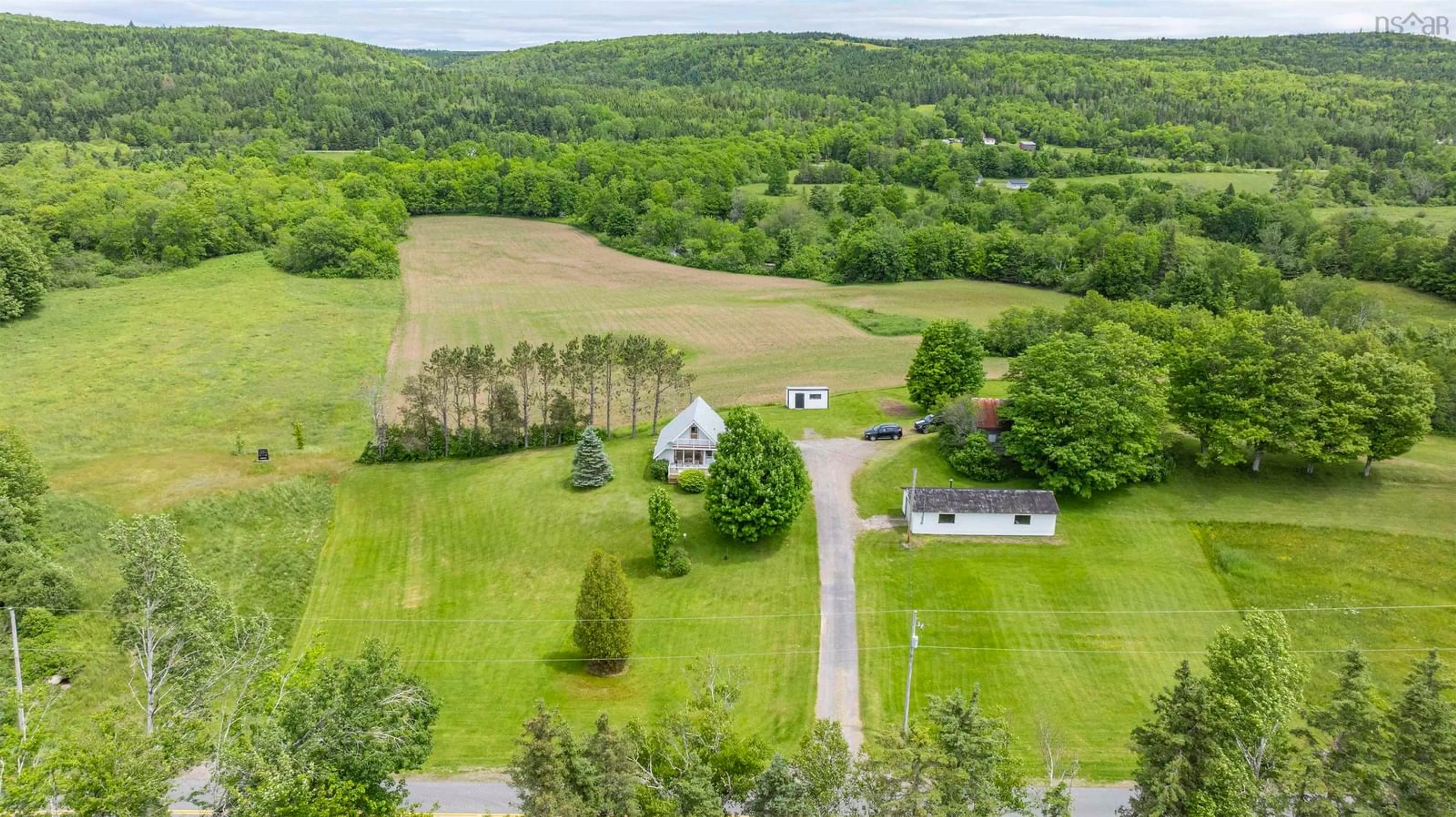 A pic from outside/outdoor area/front of a property/back of a property/a pic from drone, mountain view for 3350 East River West Side Rd, Glencoe Nova Scotia B0K 1B0