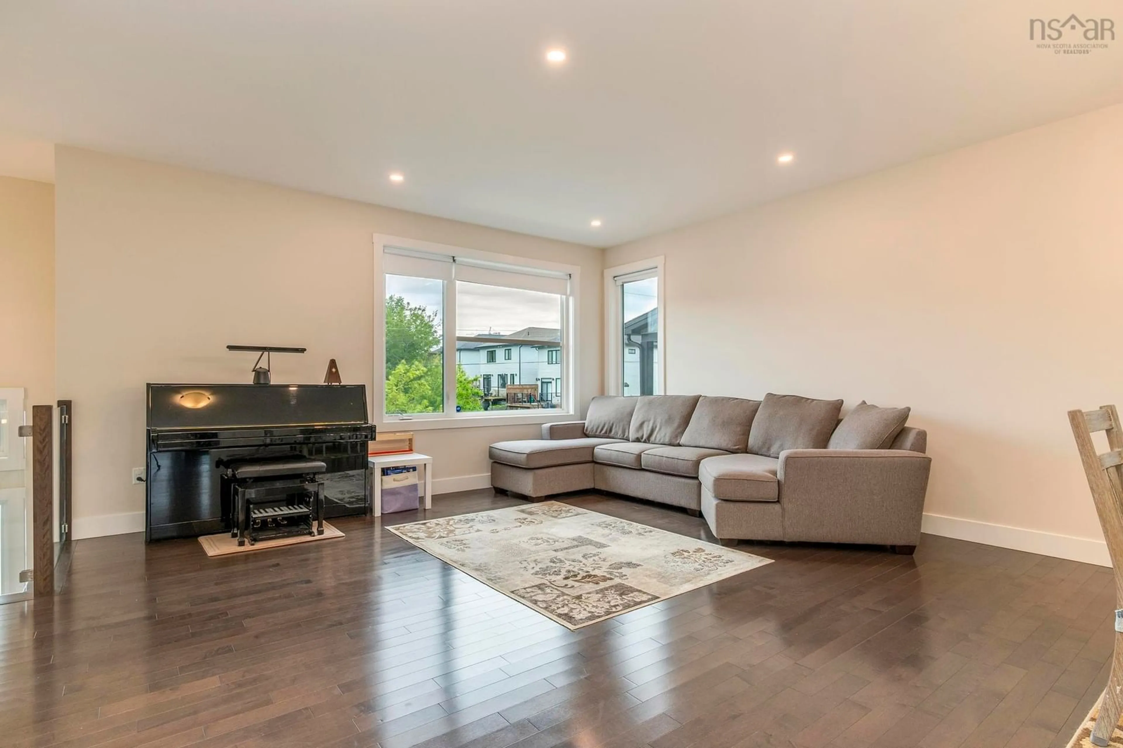 Living room with furniture, wood/laminate floor for 66 Innsbrook Way, Bedford Nova Scotia B4B 0X6