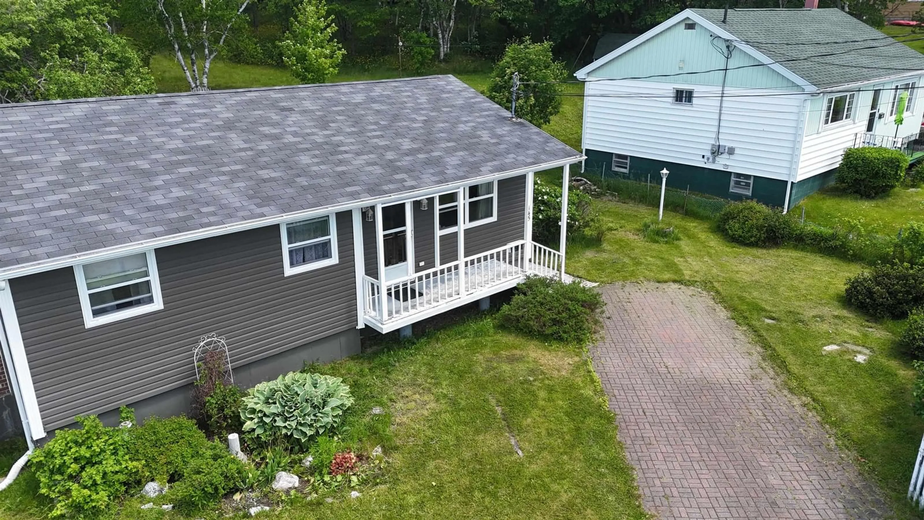 A pic from outside/outdoor area/front of a property/back of a property/a pic from drone, unknown for 145 Legacy St, Sydney Nova Scotia B1P 2X5