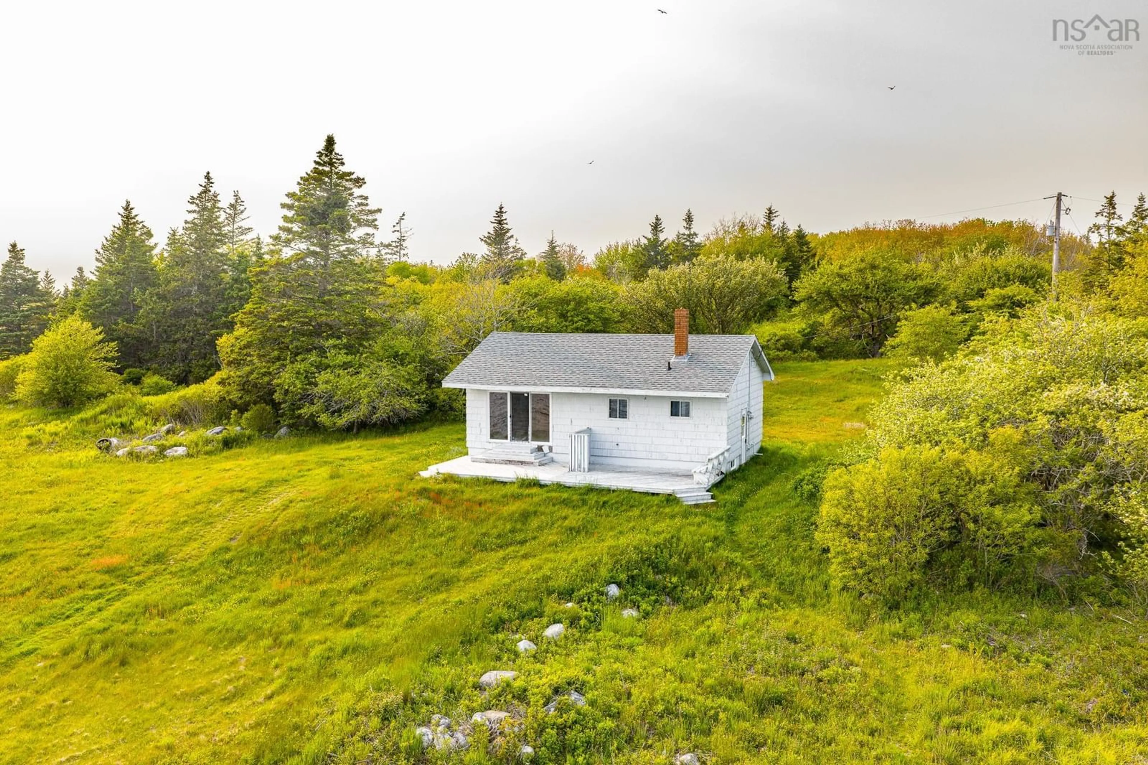 A pic from outside/outdoor area/front of a property/back of a property/a pic from drone, unknown for 1718 Sandy Point Rd, Sandy Point Nova Scotia B0T 1W0