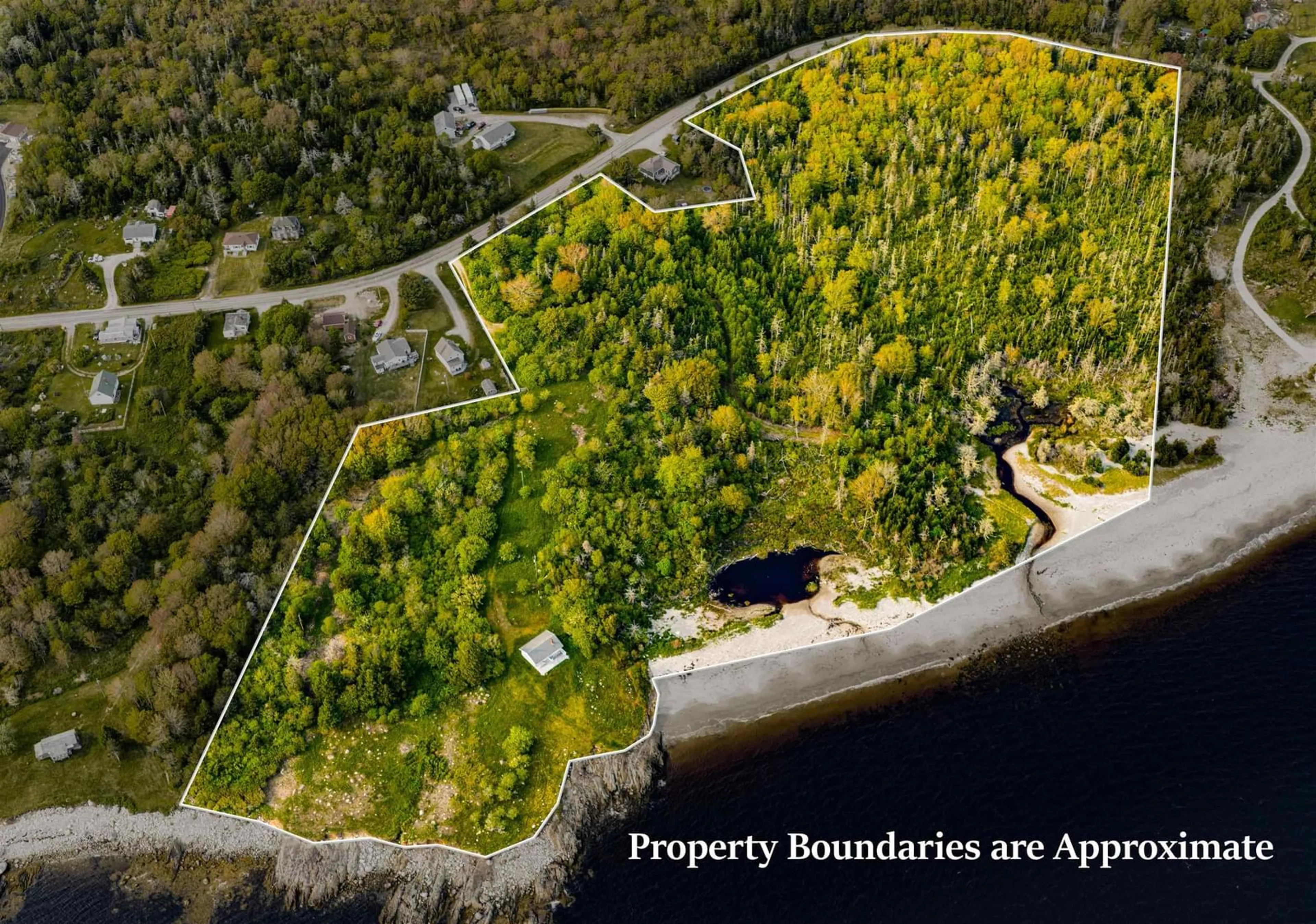 A pic from outside/outdoor area/front of a property/back of a property/a pic from drone, water/lake/river/ocean view for 1718 Sandy Point Rd, Sandy Point Nova Scotia B0T 1W0