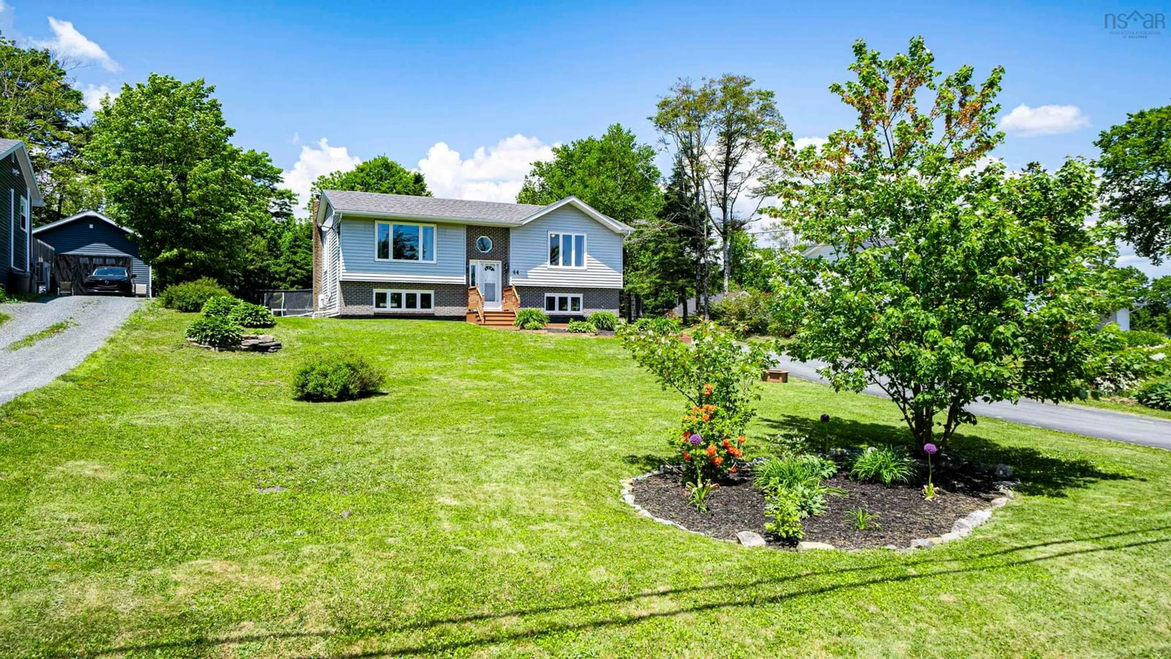 A pic from outside/outdoor area/front of a property/back of a property/a pic from drone, water/lake/river/ocean view for 64 Thomas St, Lake Echo Nova Scotia B3E 1M6