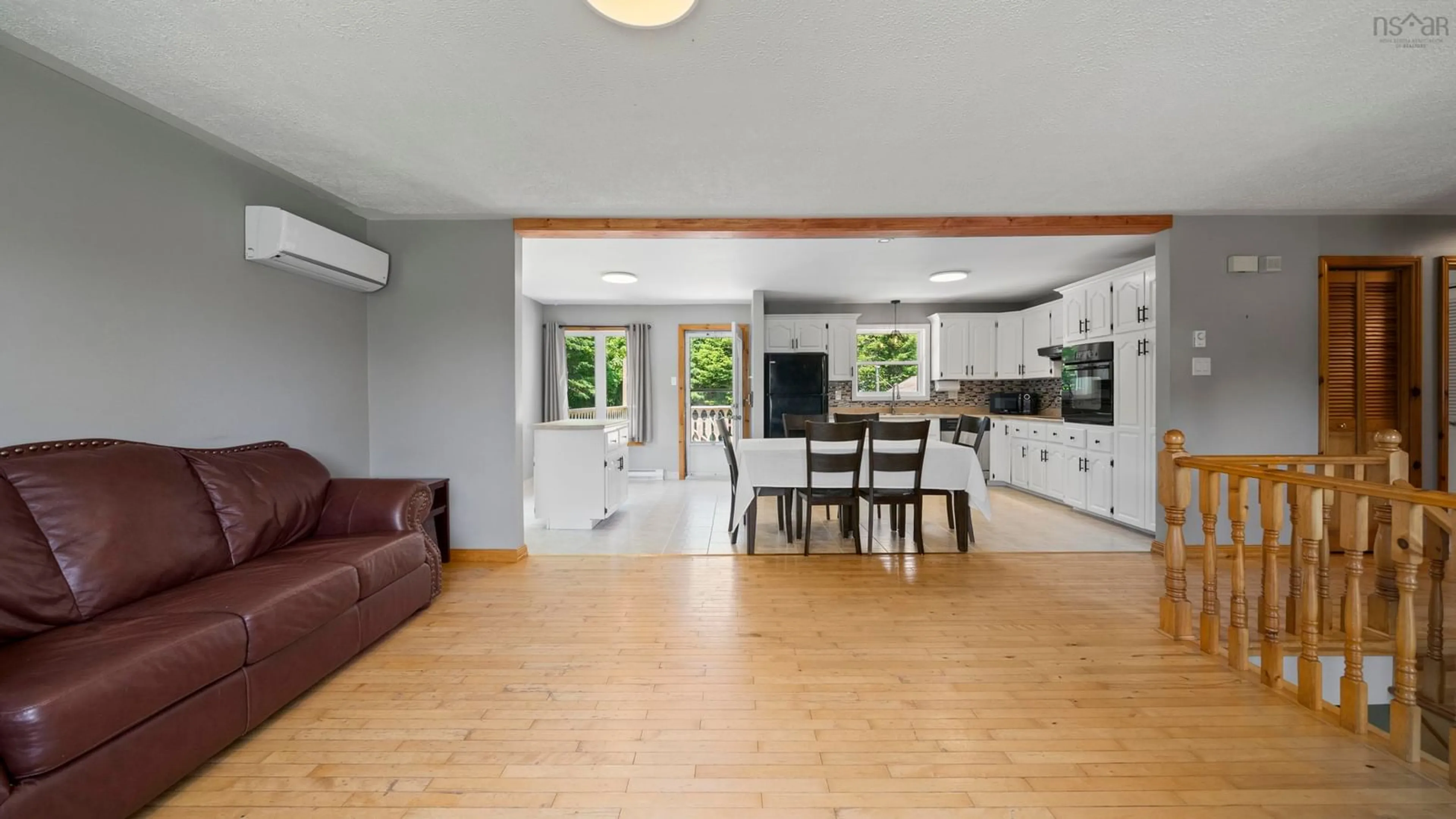 Open concept kitchen, wood/laminate floor for 64 Thomas St, Lake Echo Nova Scotia B3E 1M6