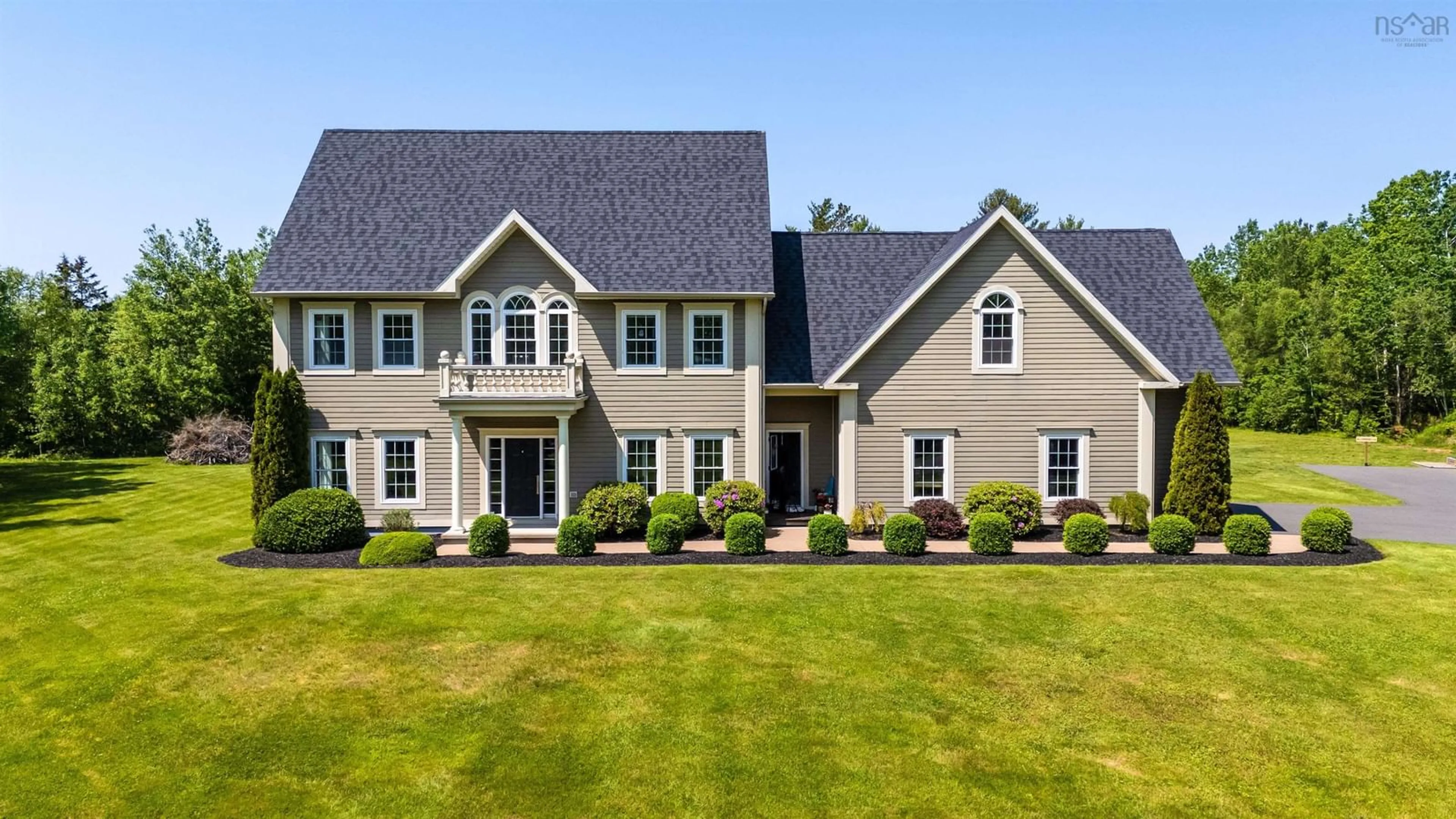 Home with vinyl exterior material, street for 13697 Highway 1, Wilmot Nova Scotia B0P 1W0