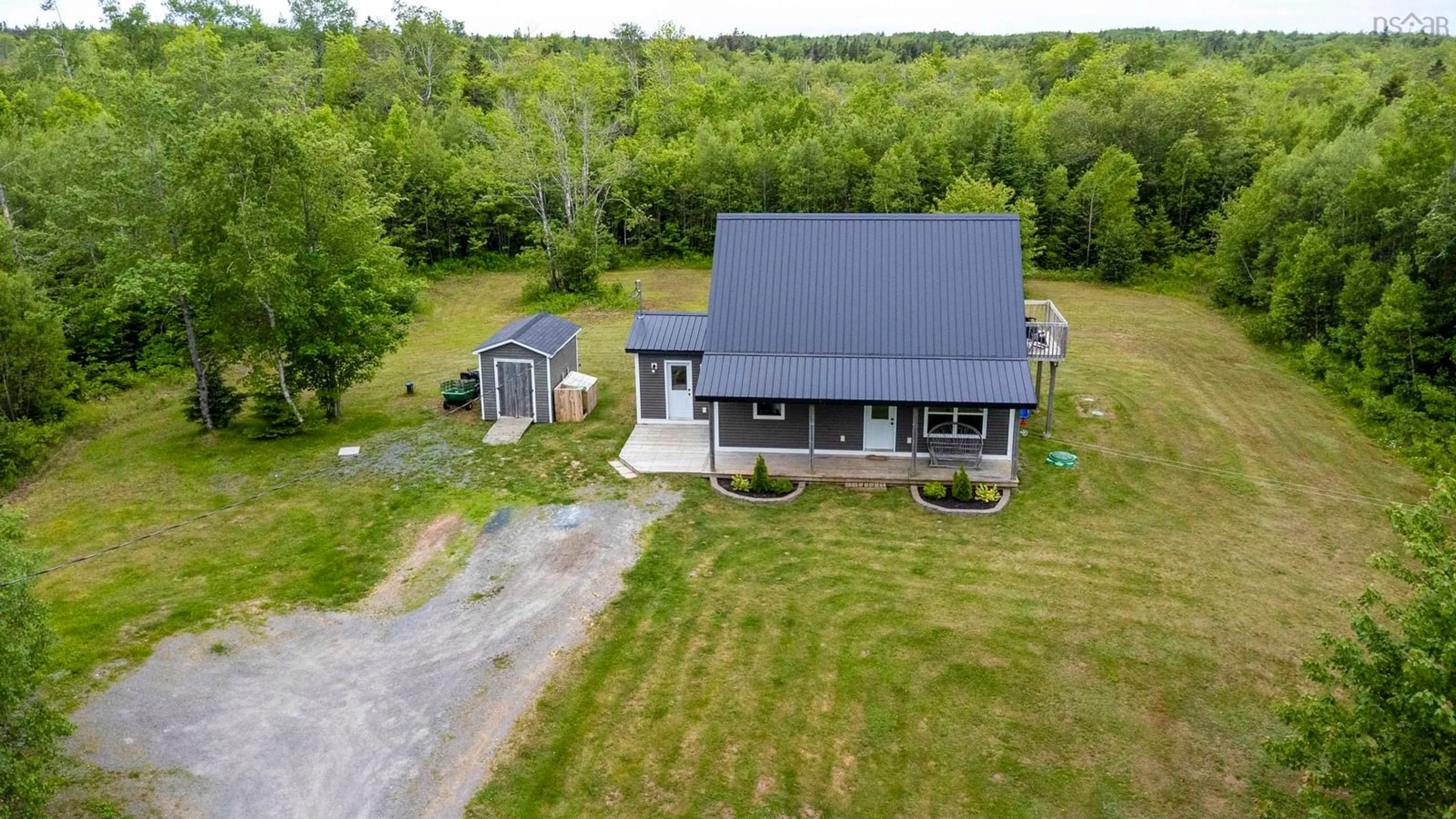 A pic from outside/outdoor area/front of a property/back of a property/a pic from drone, building for 2337 Victoria Rd, Aylesford Nova Scotia B0P 1C0