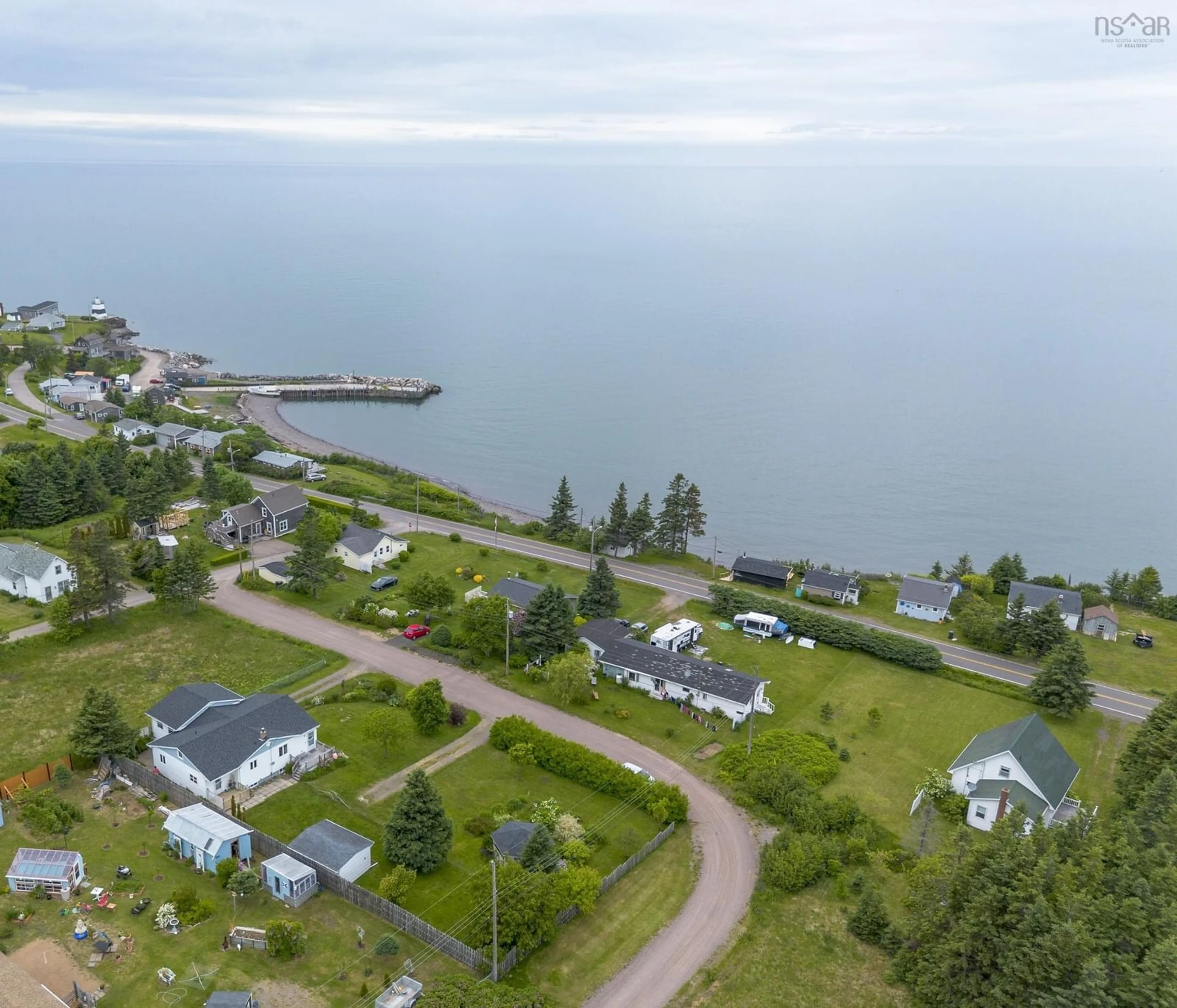 A pic from outside/outdoor area/front of a property/back of a property/a pic from drone, water/lake/river/ocean view for 133 Bay View Drive, Margaretsville Nova Scotia B0S 1N0