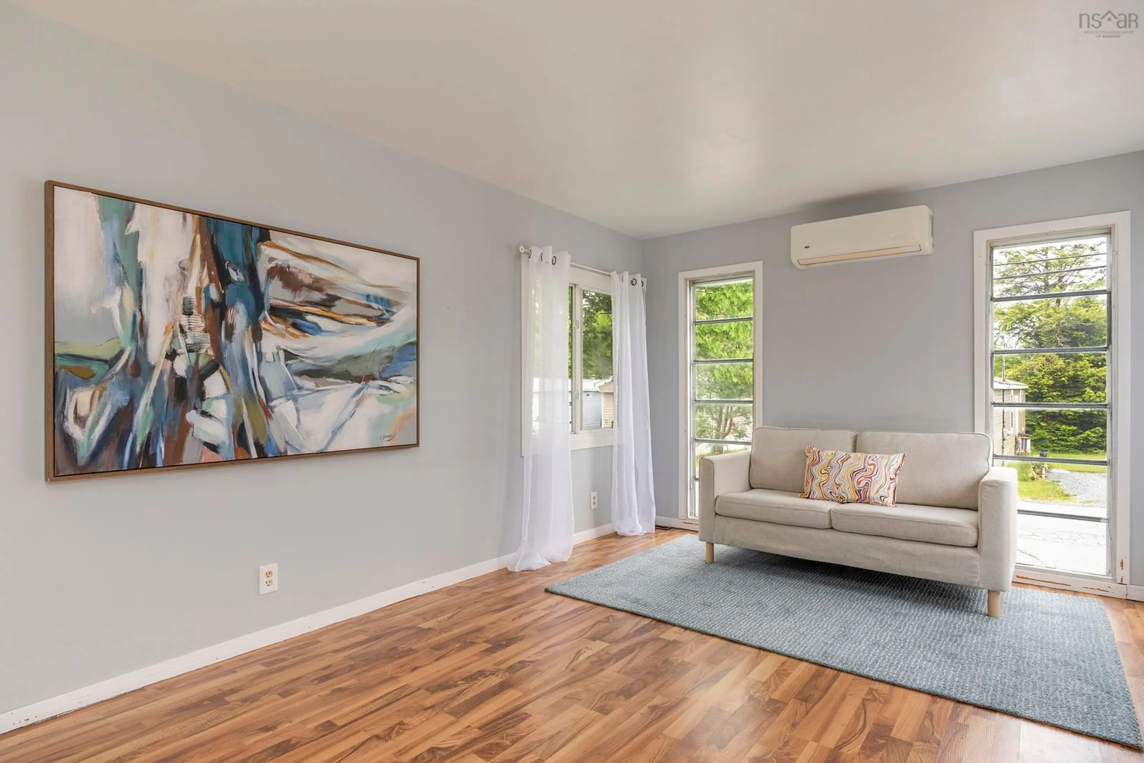 Living room with furniture, wood/laminate floor for 4 Snow White, Lake Echo Nova Scotia B3E 1C5