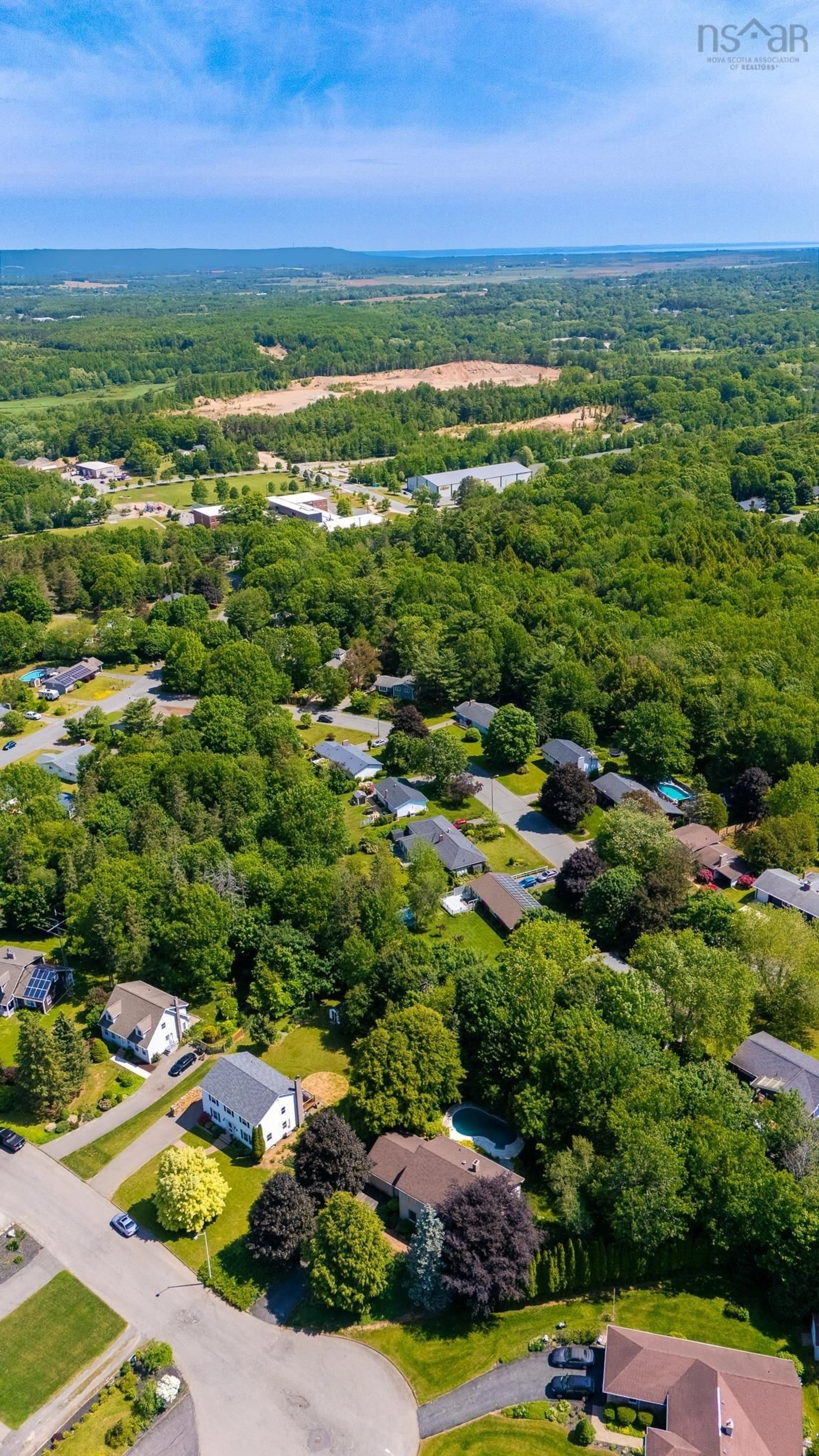 A pic from outside/outdoor area/front of a property/back of a property/a pic from drone, forest/trees view for 9 Glenlee Dr, Kentville Nova Scotia B4N 4Y5