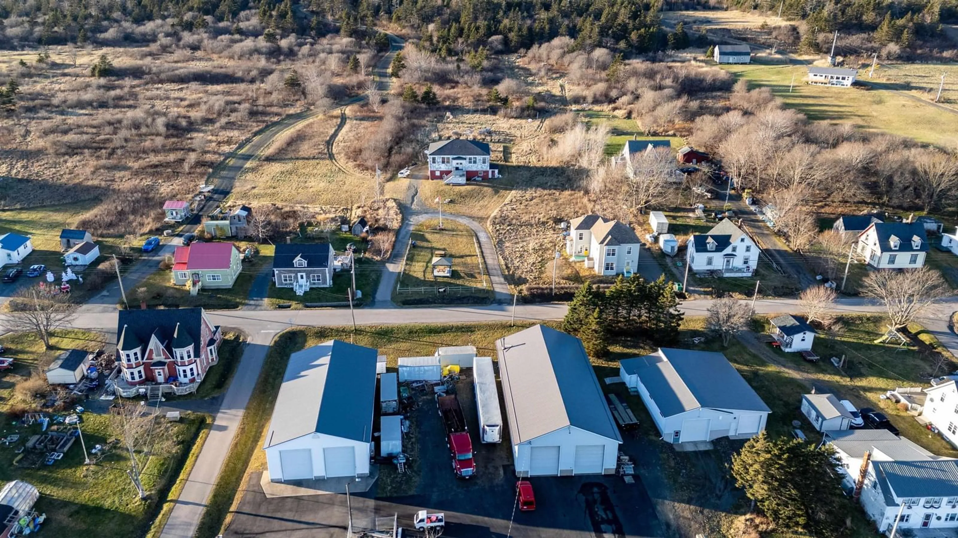 A pic from outside/outdoor area/front of a property/back of a property/a pic from drone, street for 63 Second Street, Westport Nova Scotia B0V 1H0