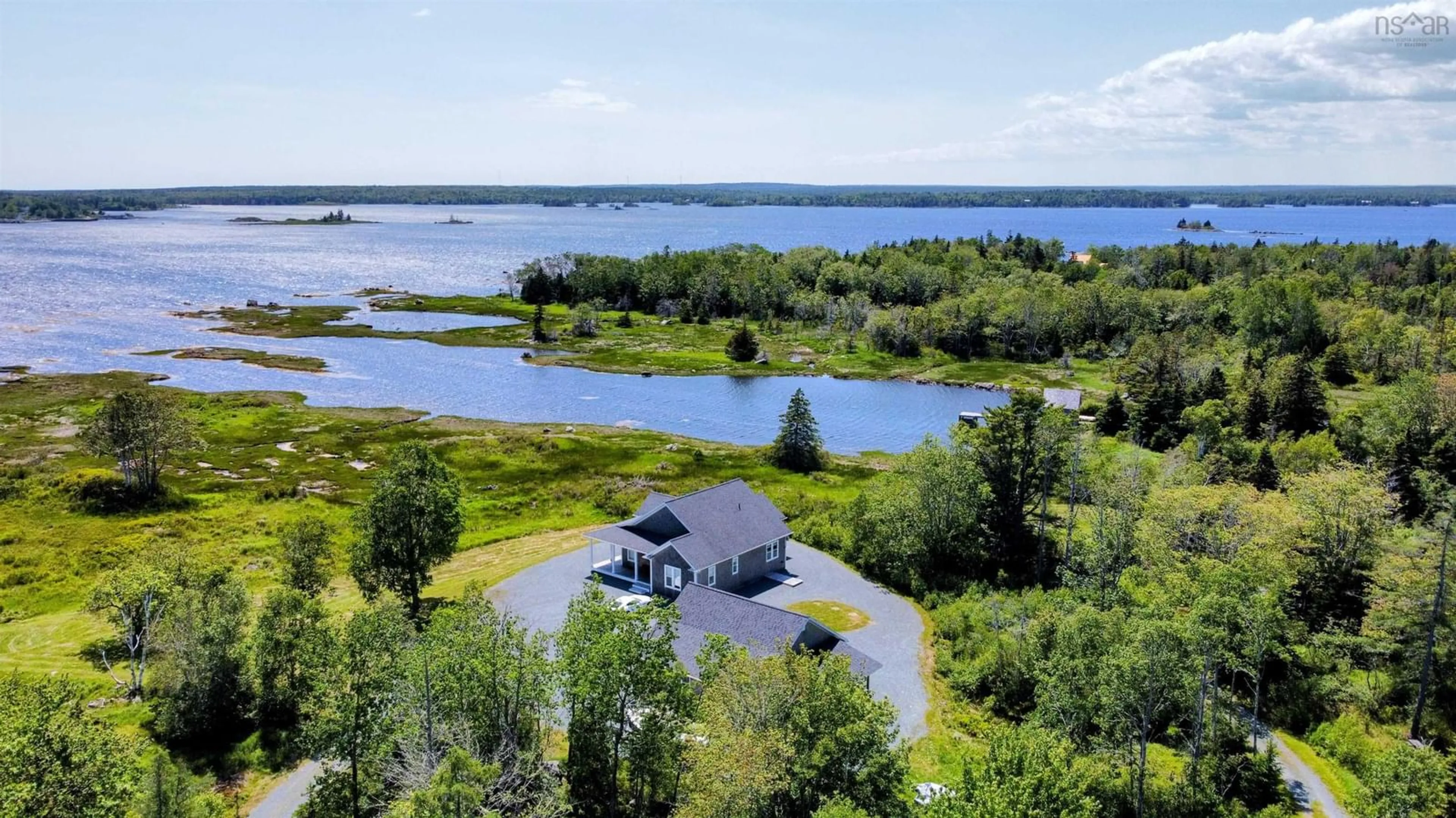 A pic from outside/outdoor area/front of a property/back of a property/a pic from drone, water/lake/river/ocean view for 274 Indian Point Rd, East Port Medway Nova Scotia B0J 2H0
