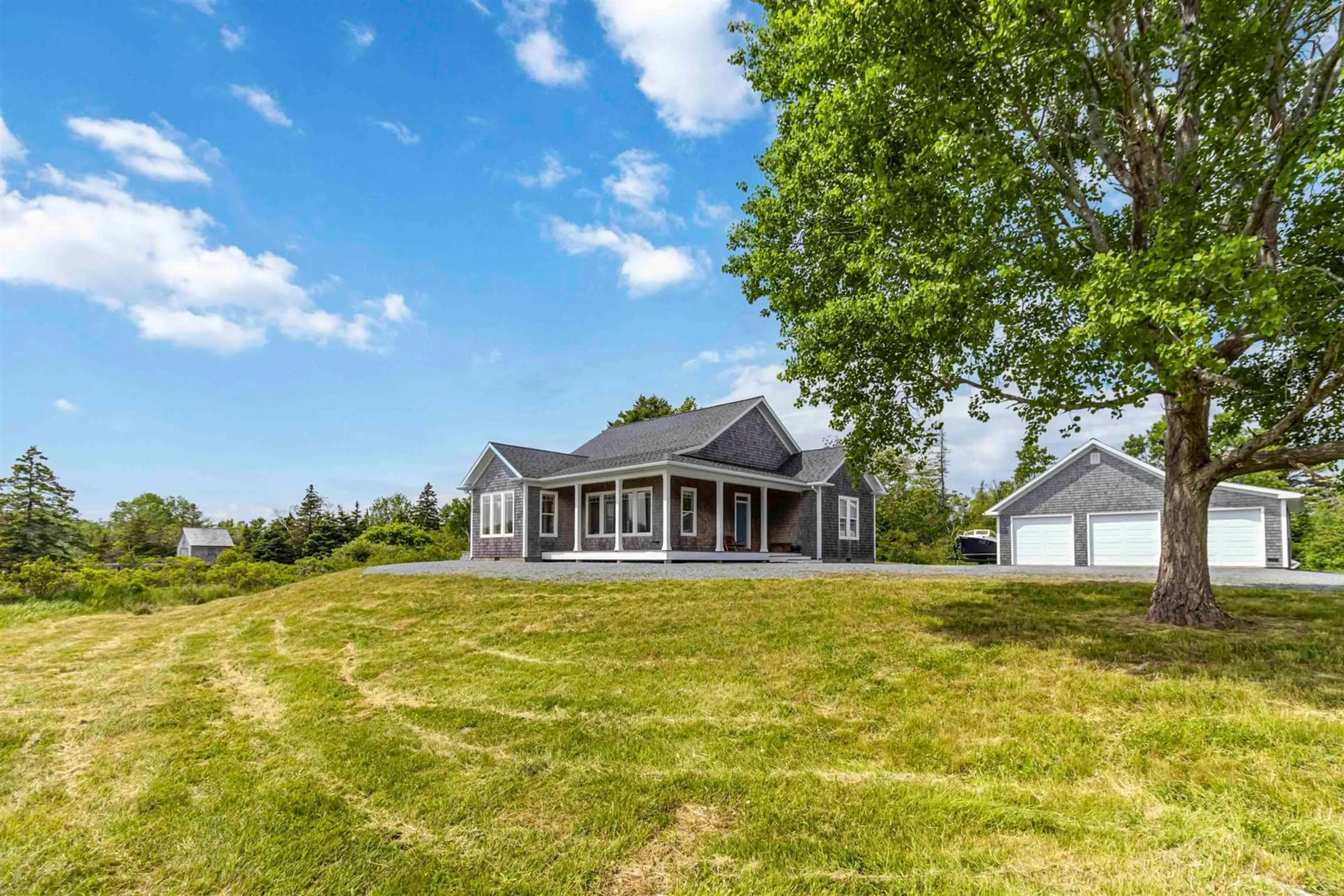 A pic from outside/outdoor area/front of a property/back of a property/a pic from drone, unknown for 274 Indian Point Rd, East Port Medway Nova Scotia B0J 2H0