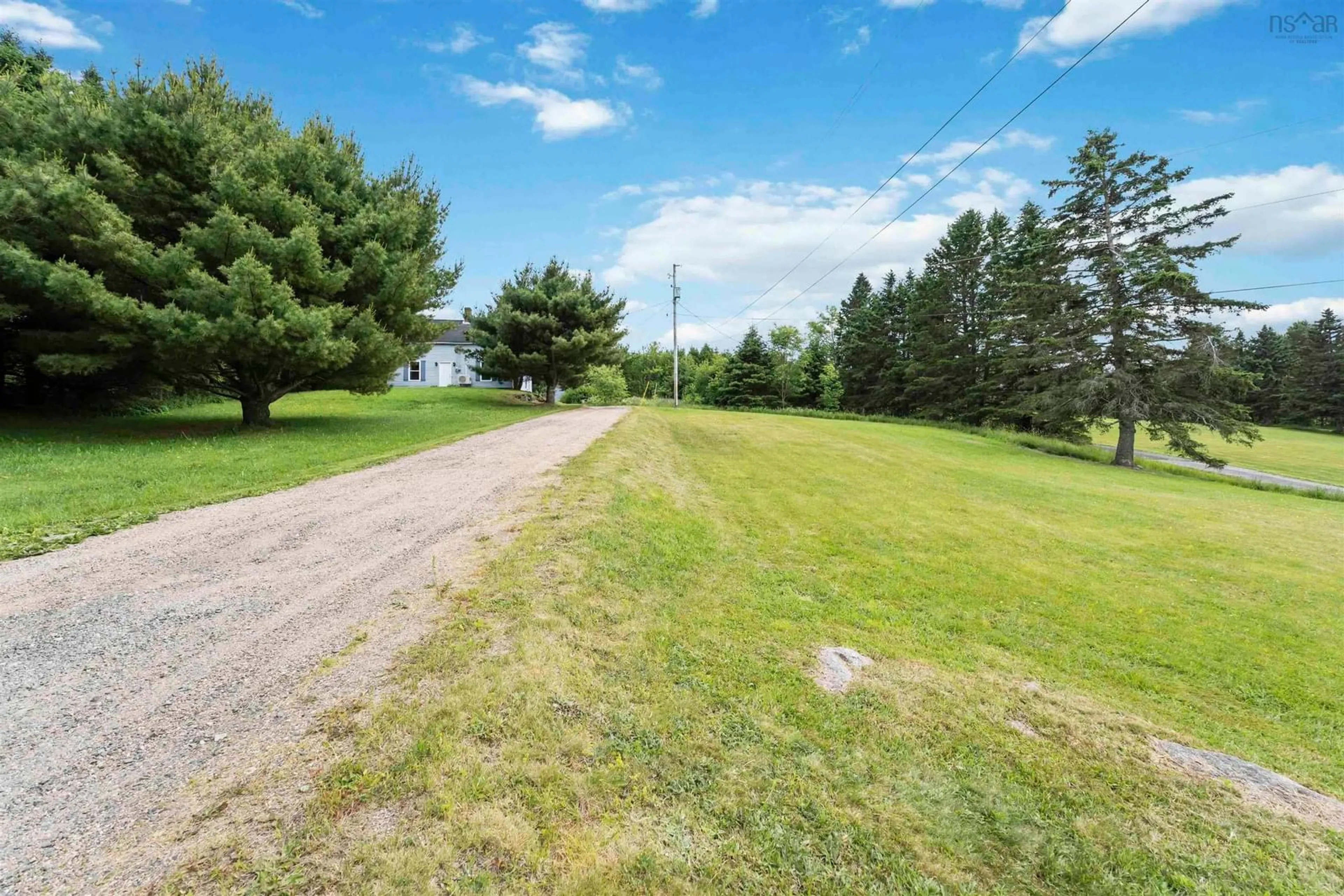 A pic from outside/outdoor area/front of a property/back of a property/a pic from drone, water/lake/river/ocean view for 1302 Highway 201, Round Hill Nova Scotia B0S 1A0