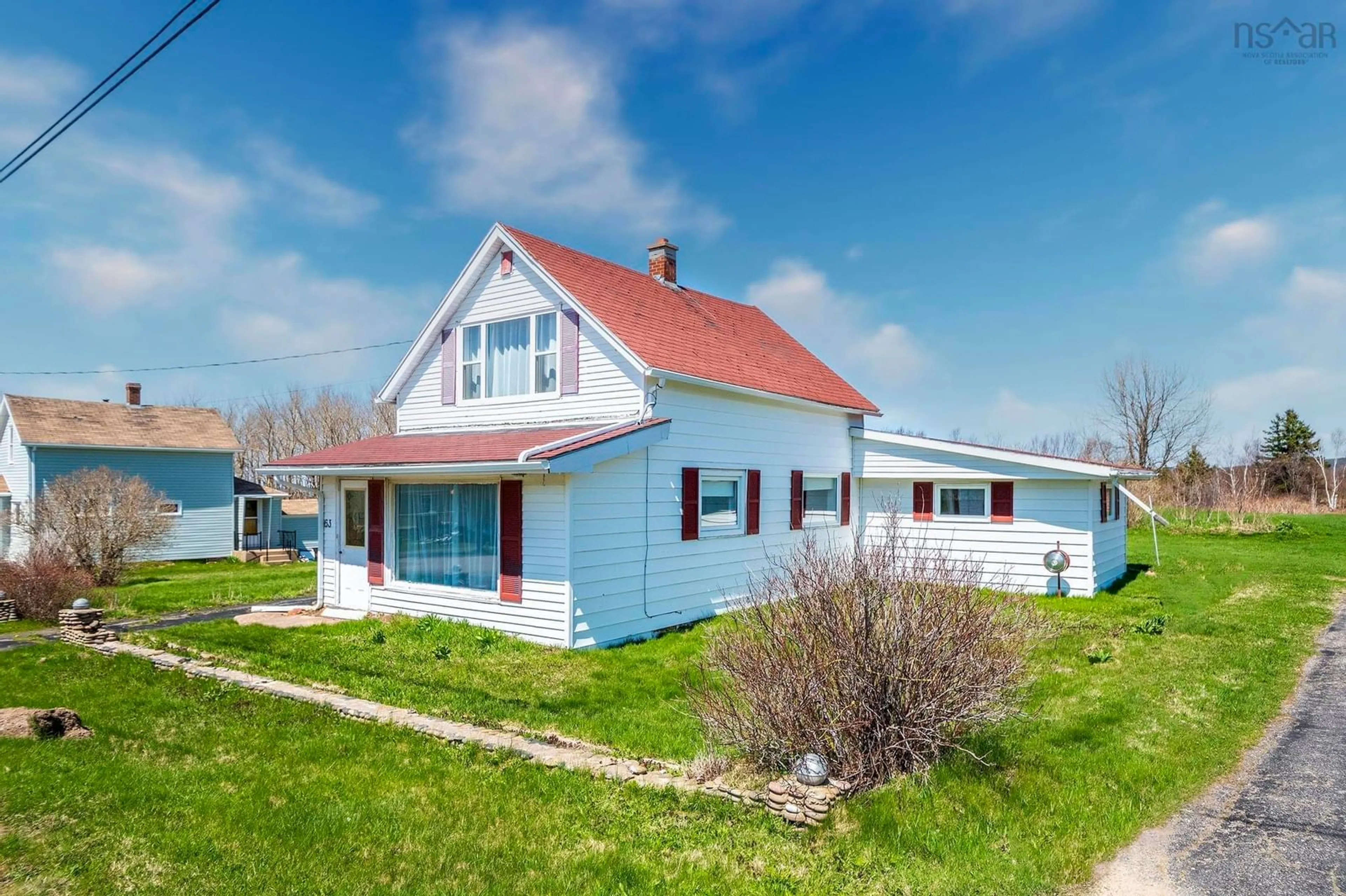 Home with vinyl exterior material, street for 63 Maclean St, Inverness Nova Scotia B0E 1N0