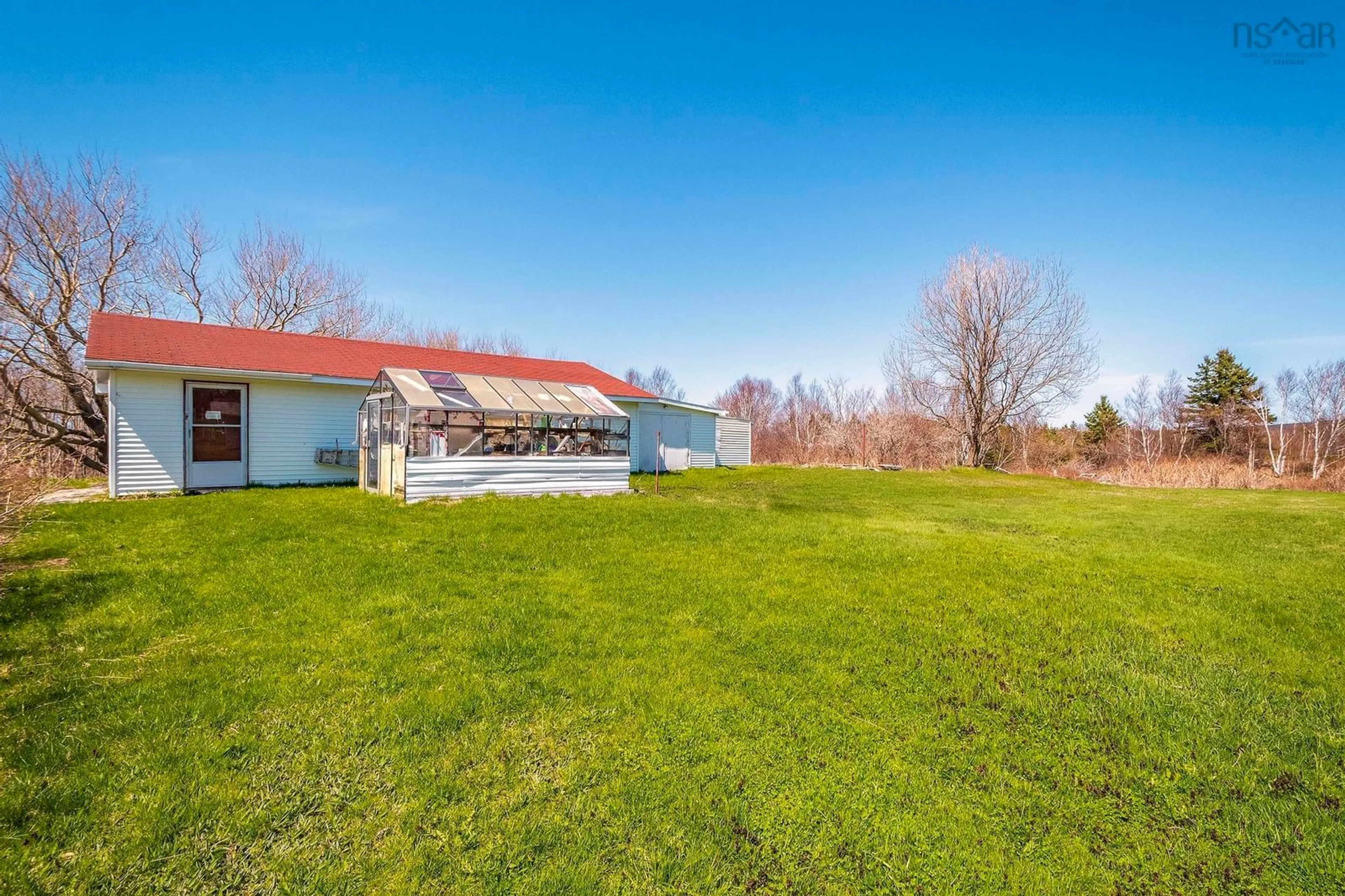 A pic from outside/outdoor area/front of a property/back of a property/a pic from drone, water/lake/river/ocean view for 63 Maclean St, Inverness Nova Scotia B0E 1N0