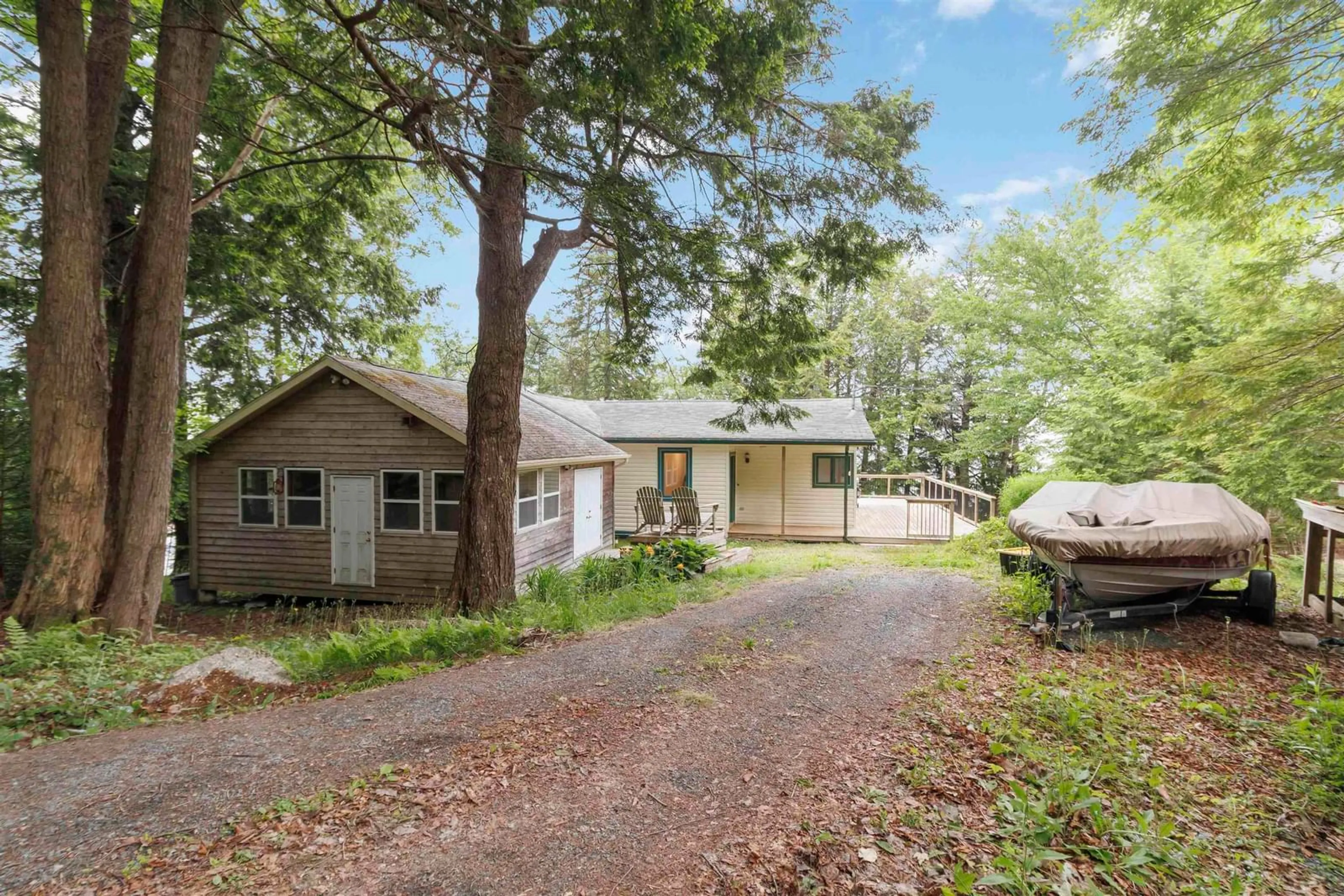 A pic from outside/outdoor area/front of a property/back of a property/a pic from drone, forest/trees view for 42 West Side Rd, Porters Lake Nova Scotia B3E 1G9