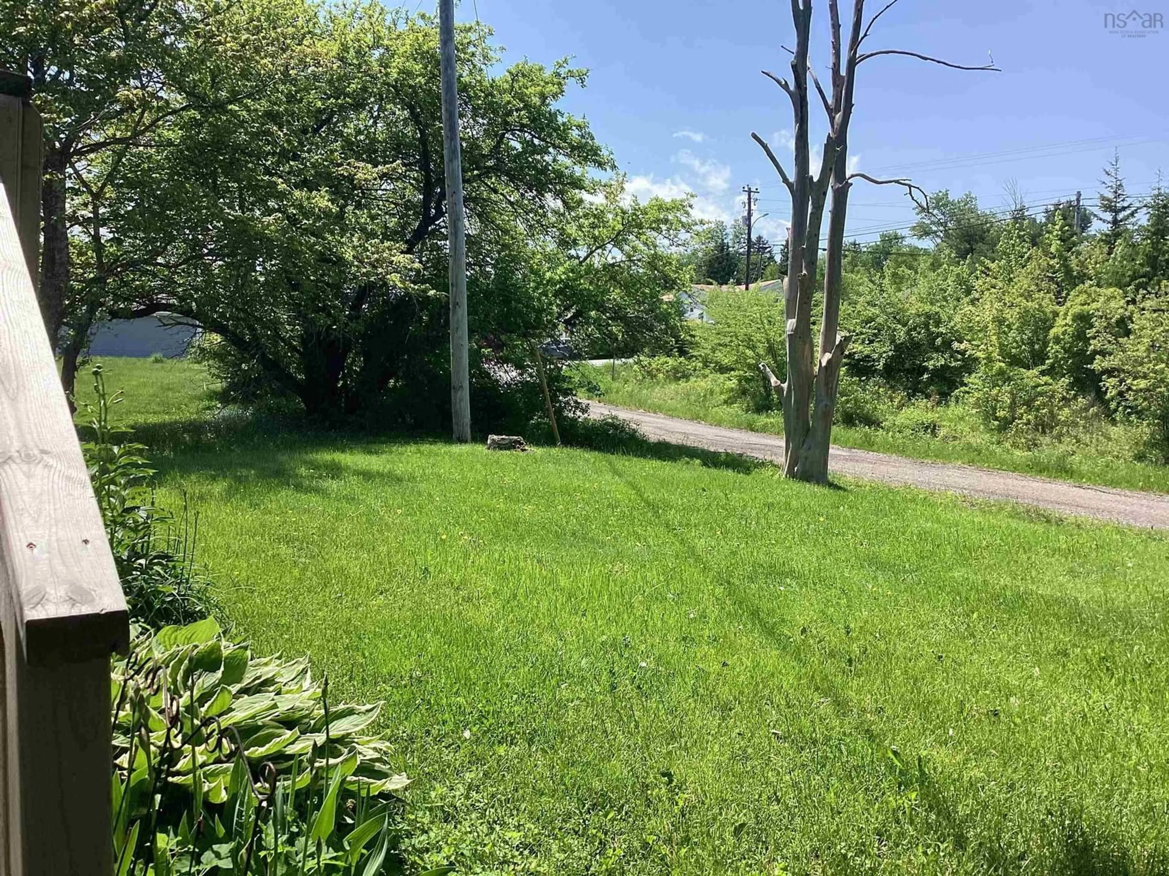 A pic from outside/outdoor area/front of a property/back of a property/a pic from drone, street for 82 Old Victoria Rd, Port Hastings Nova Scotia B9A 1L4