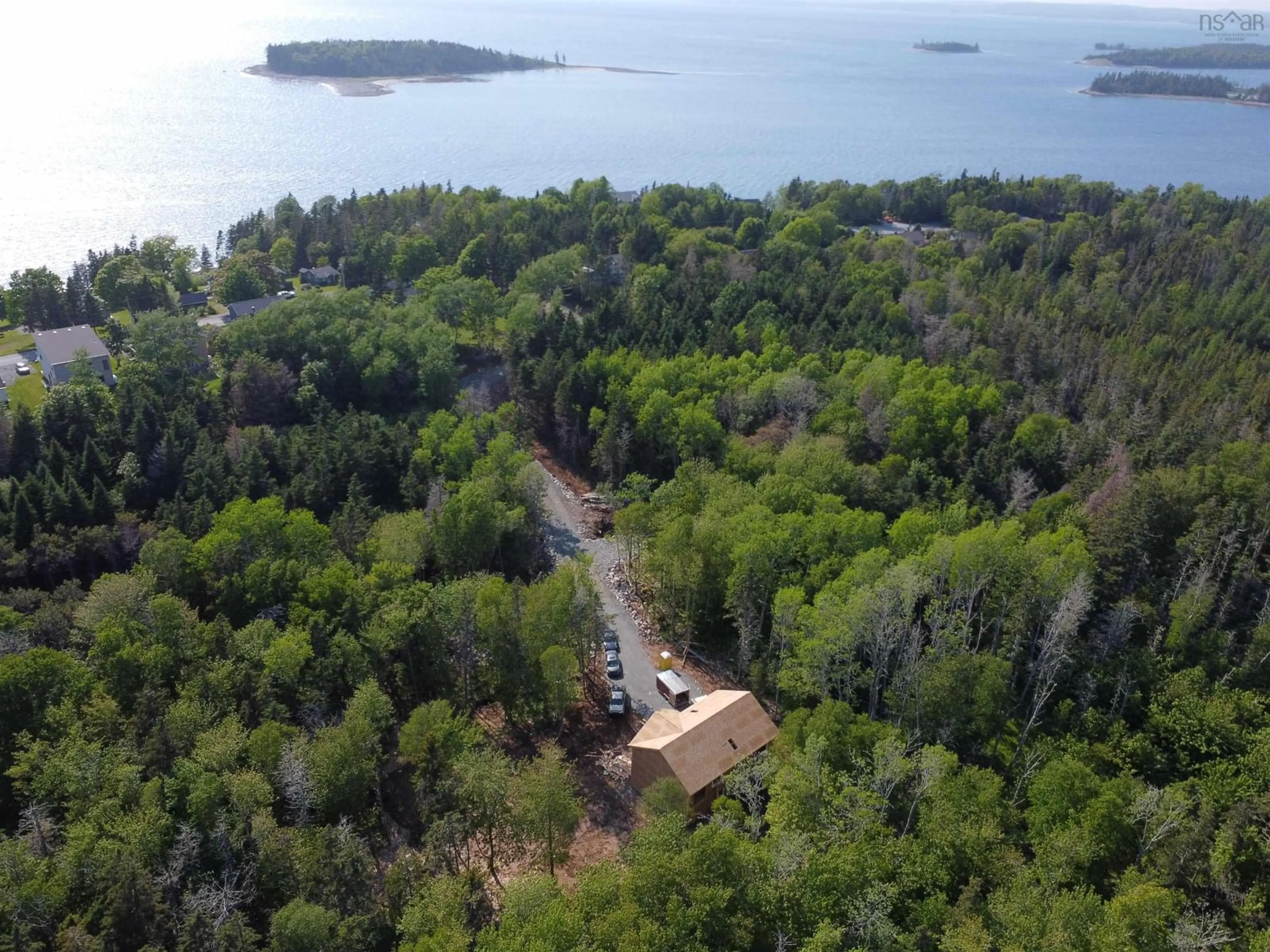 A pic from outside/outdoor area/front of a property/back of a property/a pic from drone, water/lake/river/ocean view for 51 Lukes Lane, Hackett's Cove Nova Scotia B3Z 3J9