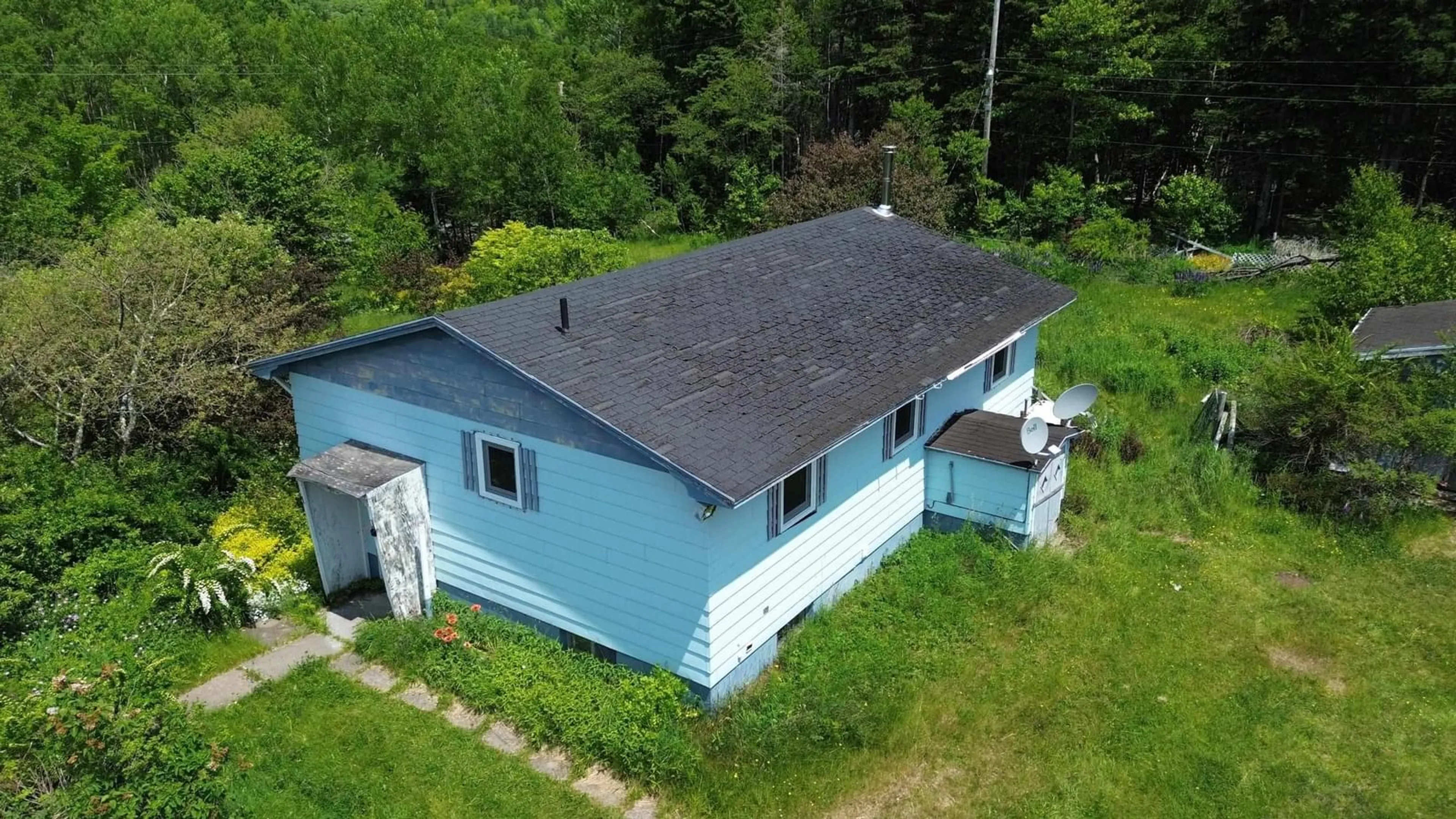 A pic from outside/outdoor area/front of a property/back of a property/a pic from drone, building for 7721 Cabot St, Margaree Forks Nova Scotia B0E 2A0