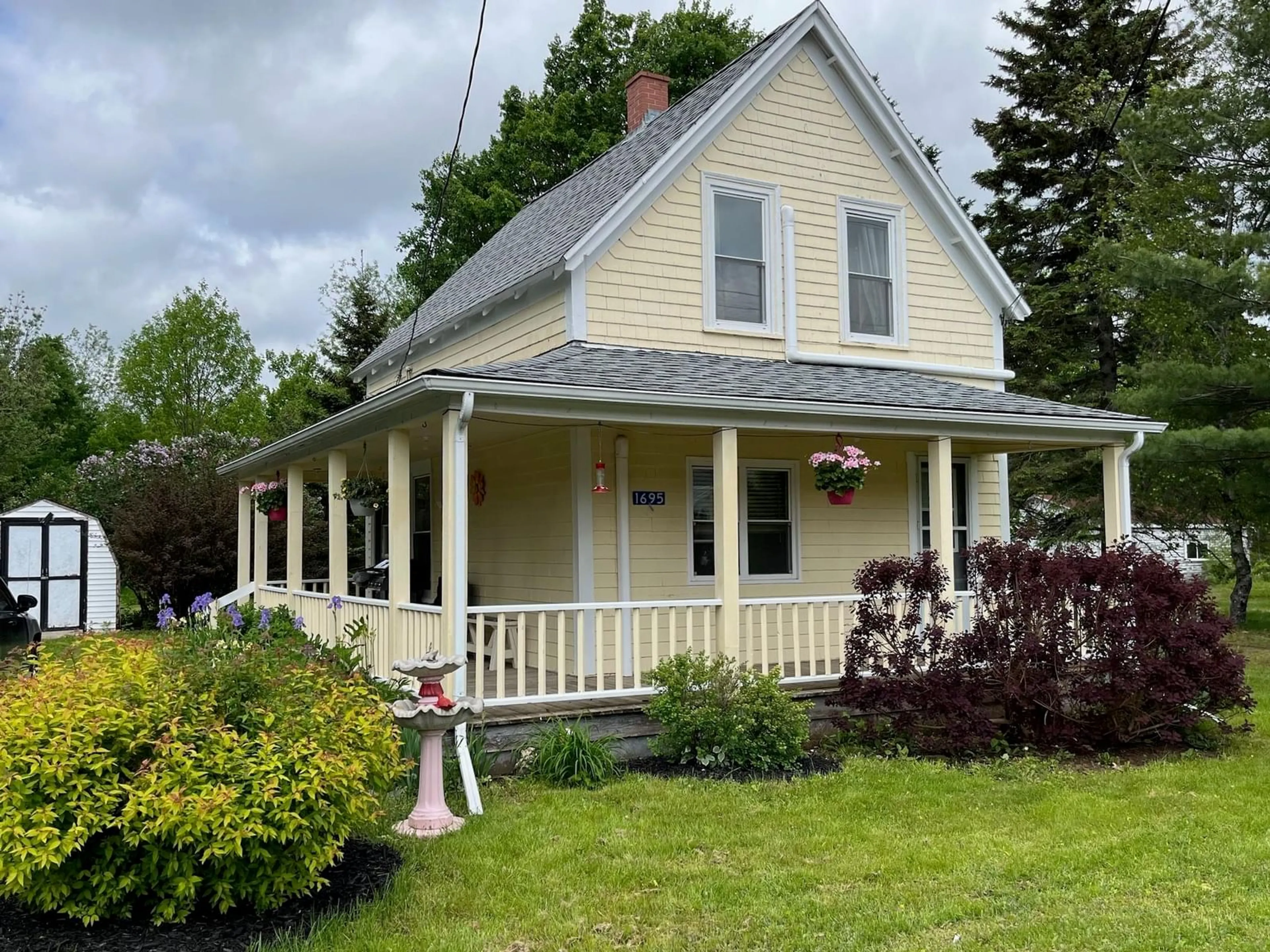 Home with vinyl exterior material, street for 1695 Black Rock Rd, Waterville Nova Scotia B0P 1V0