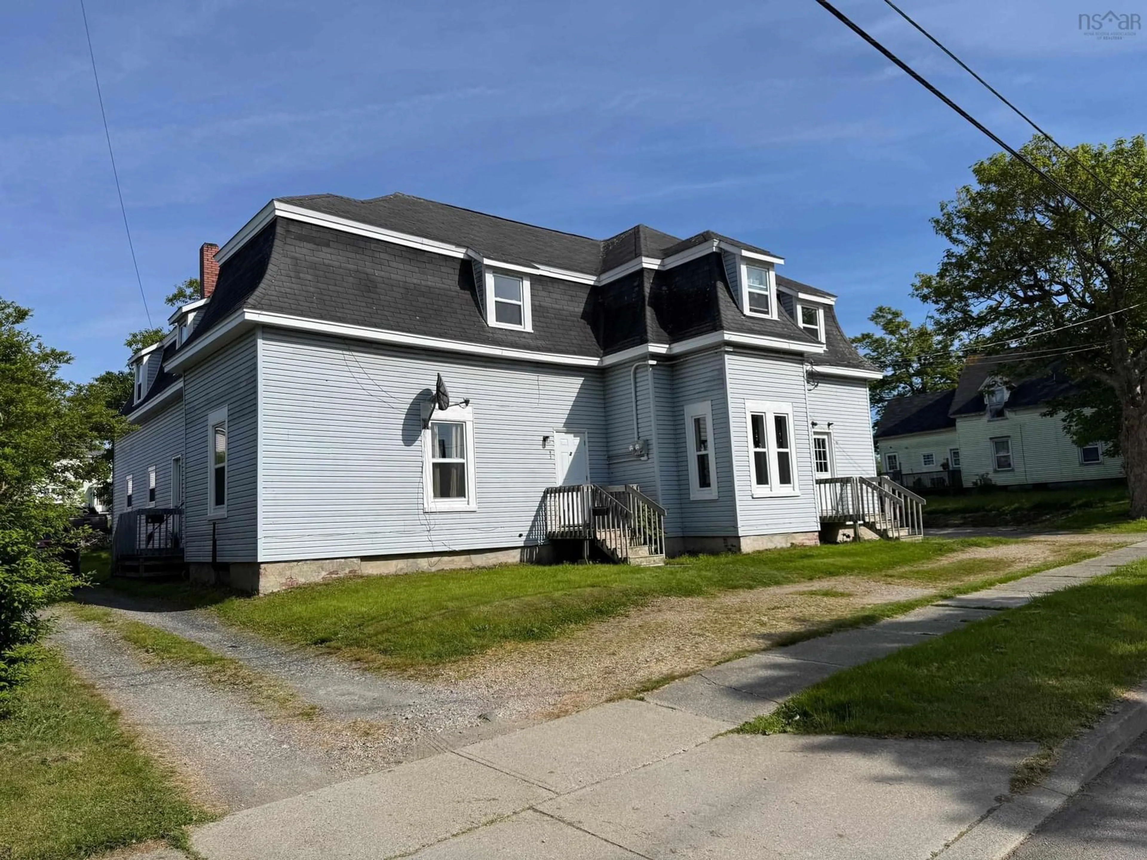 A pic from outside/outdoor area/front of a property/back of a property/a pic from drone, street for 95-97 Brunswick St, Yarmouth Nova Scotia B5A 2G7
