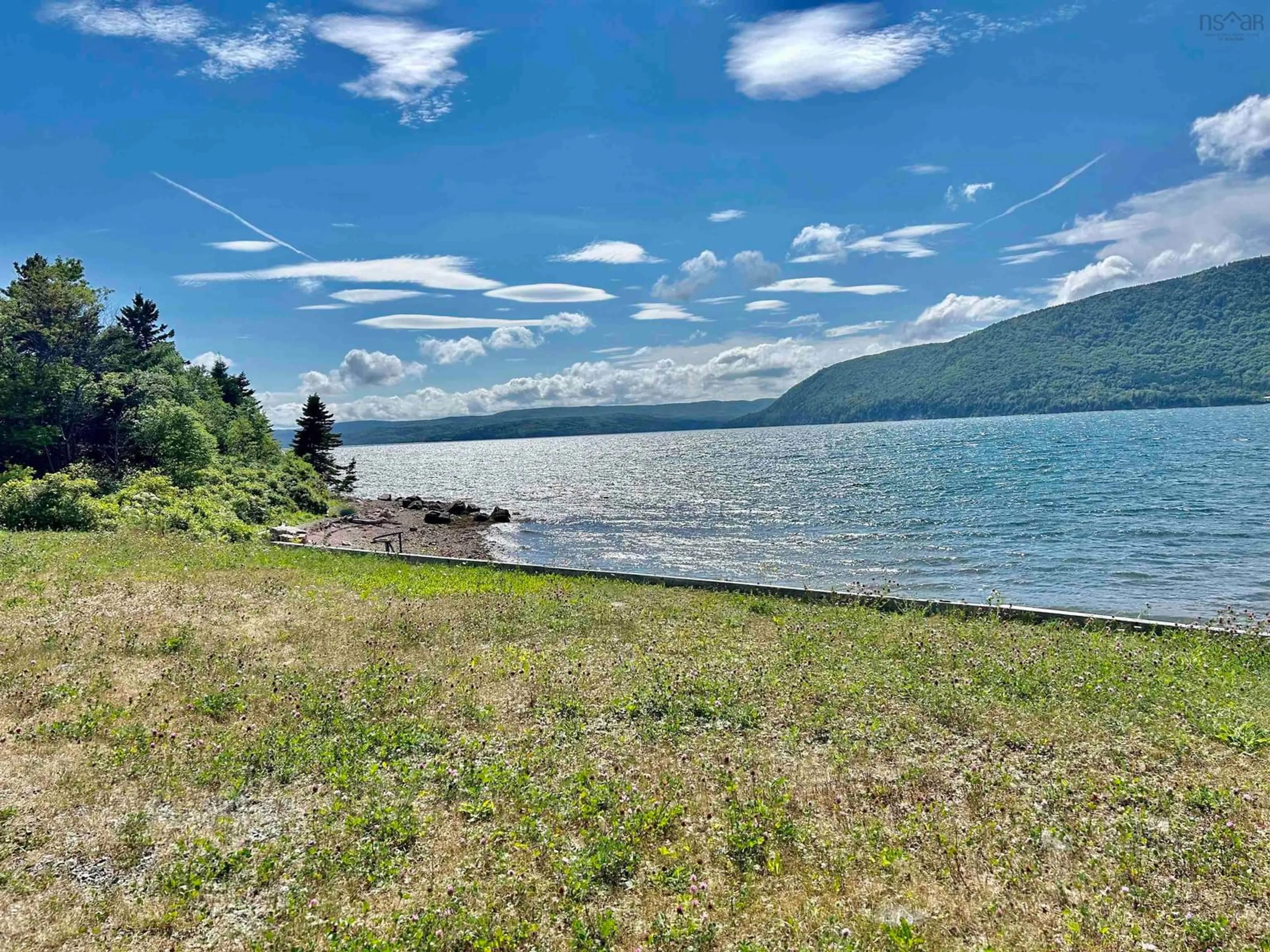A pic from outside/outdoor area/front of a property/back of a property/a pic from drone, water/lake/river/ocean view for 1081 Highway 312, Englishtown Nova Scotia B0C 1H0