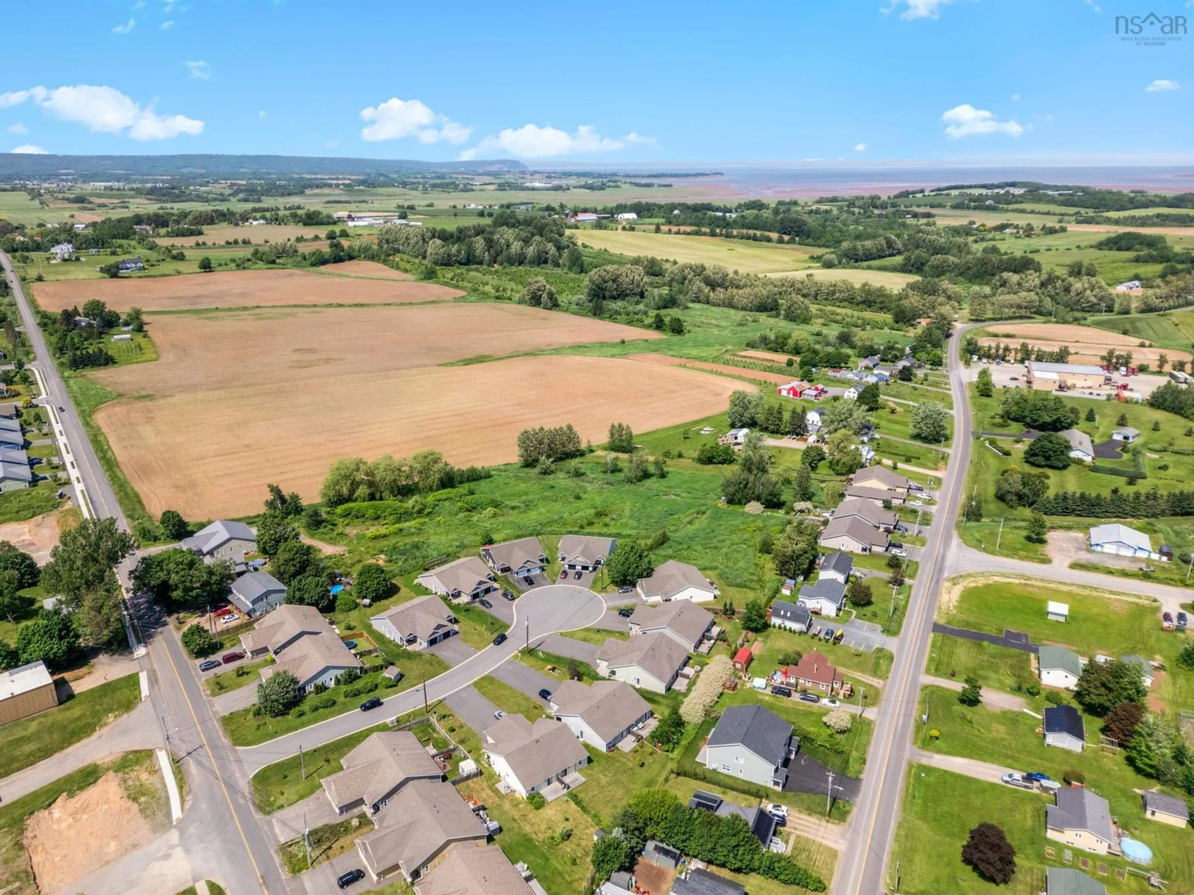 A pic from outside/outdoor area/front of a property/back of a property/a pic from drone, mountain view for 16 Selena Crt, Port Williams Nova Scotia B0P 1T0