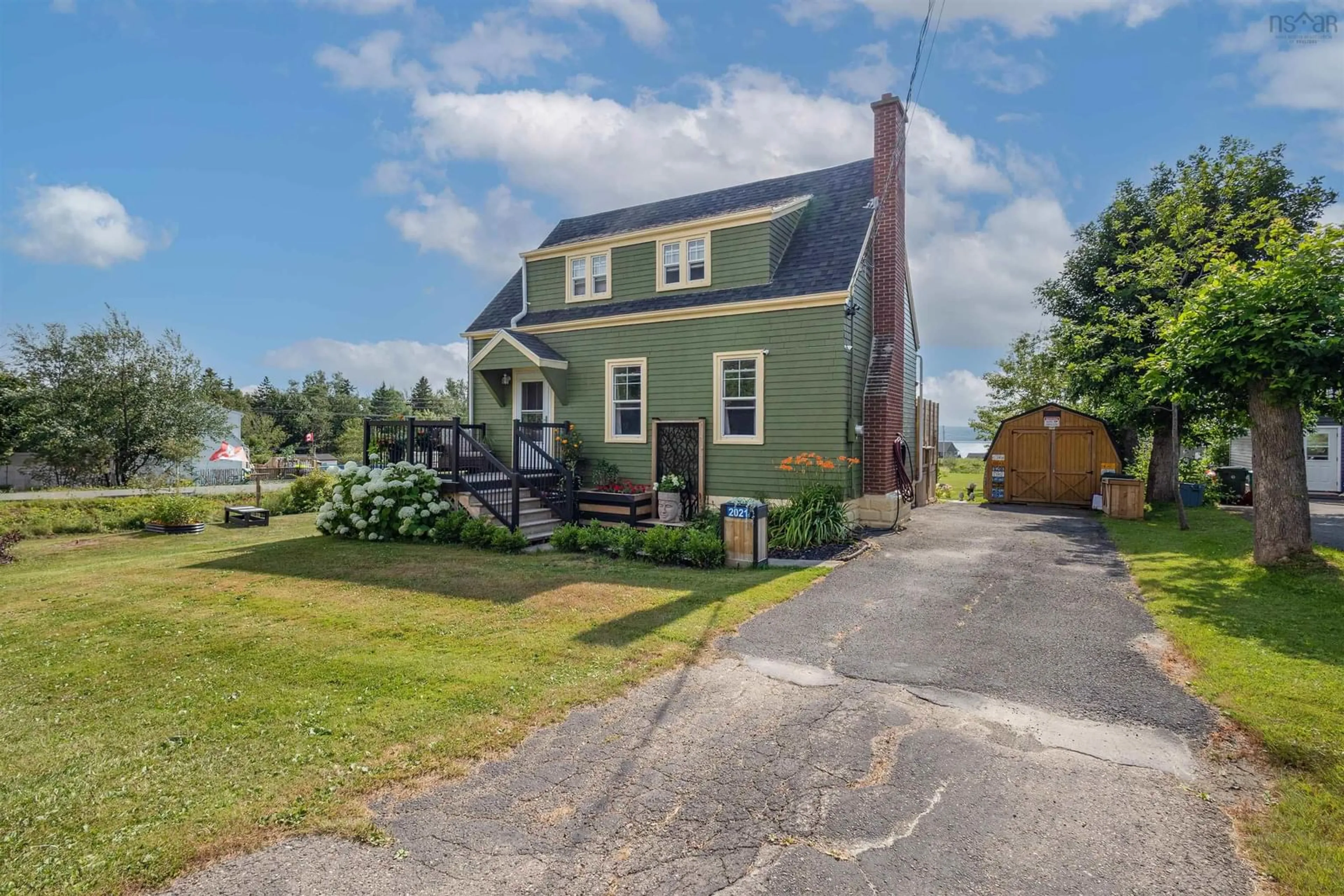 A pic from outside/outdoor area/front of a property/back of a property/a pic from drone, street for 2021 Highway 28 Hwy, South Bar Nova Scotia B1N 3H8