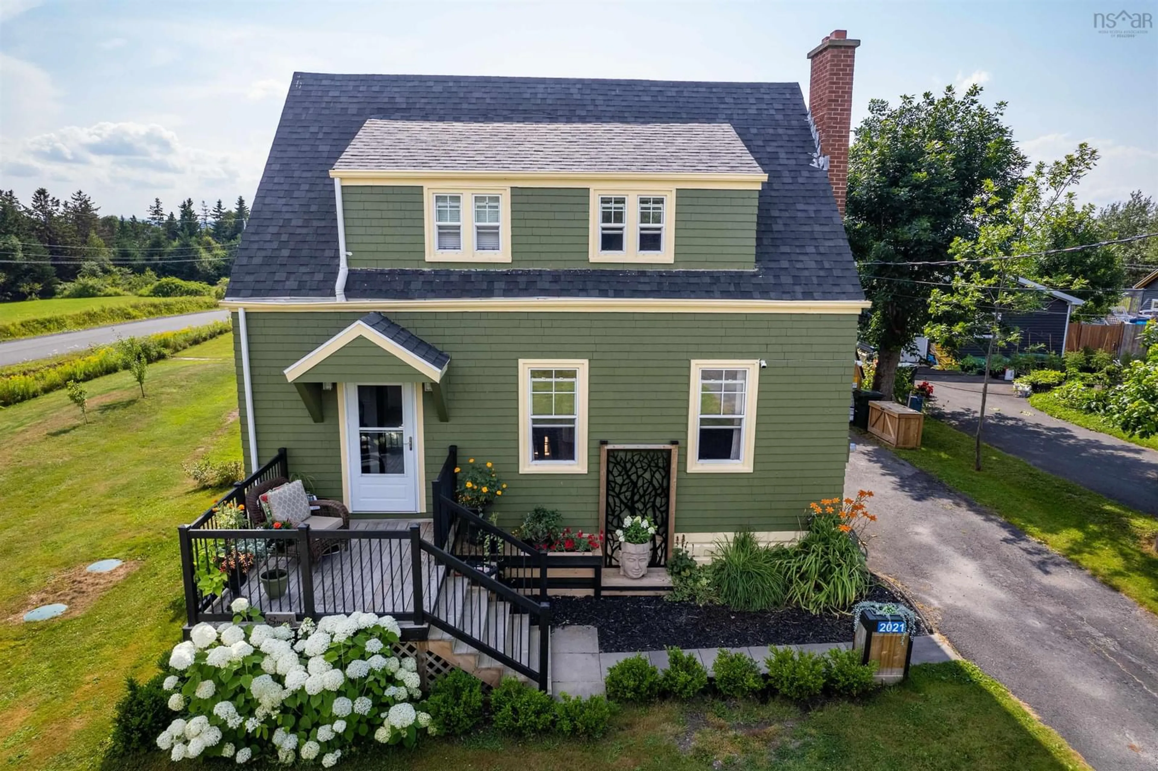 A pic from outside/outdoor area/front of a property/back of a property/a pic from drone, street for 2021 Highway 28 Hwy, South Bar Nova Scotia B1N 3H8