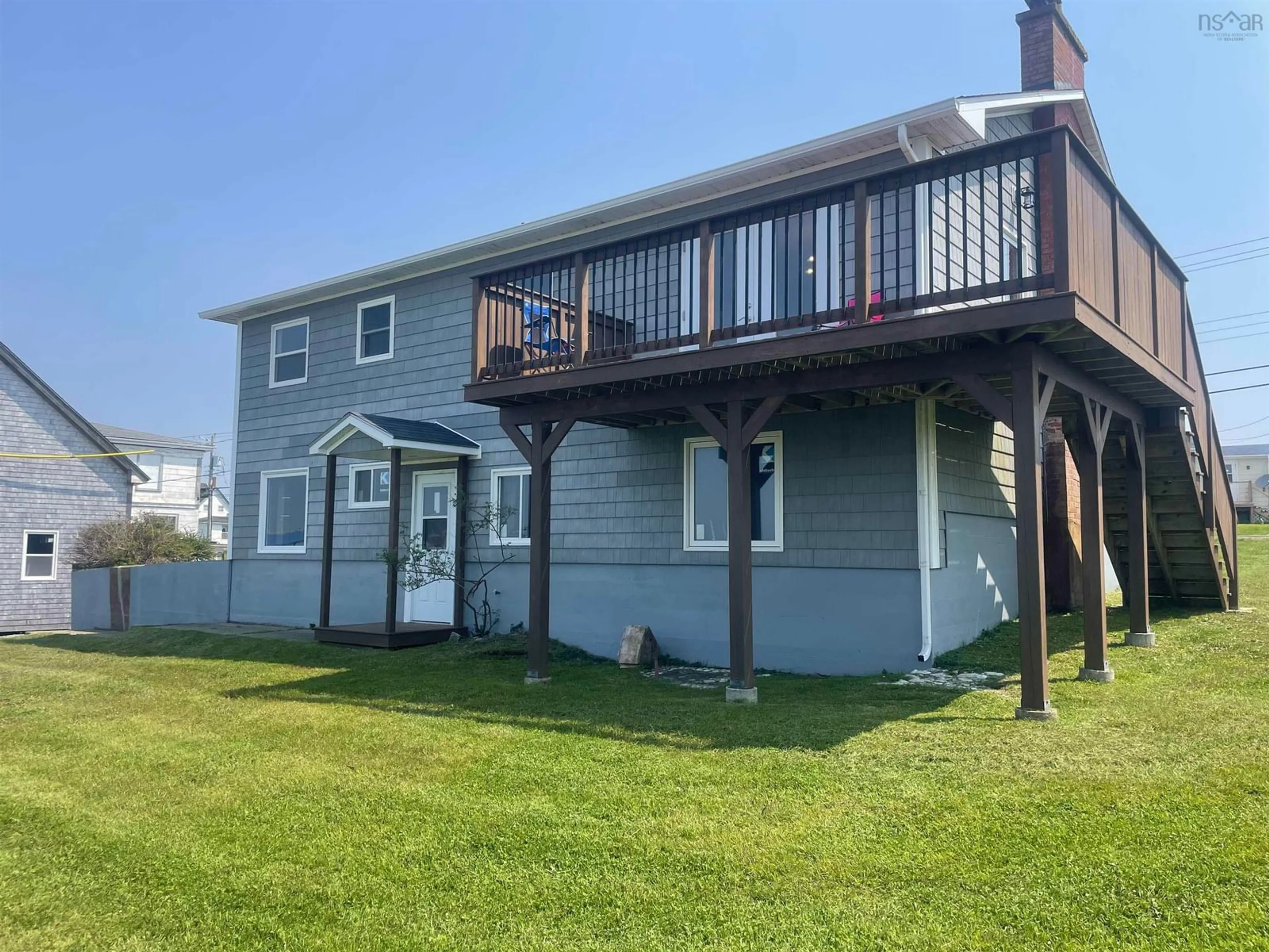 A pic from outside/outdoor area/front of a property/back of a property/a pic from drone, water/lake/river/ocean view for 2788 Main Street St, Clark's Harbour Nova Scotia B0W 1P0