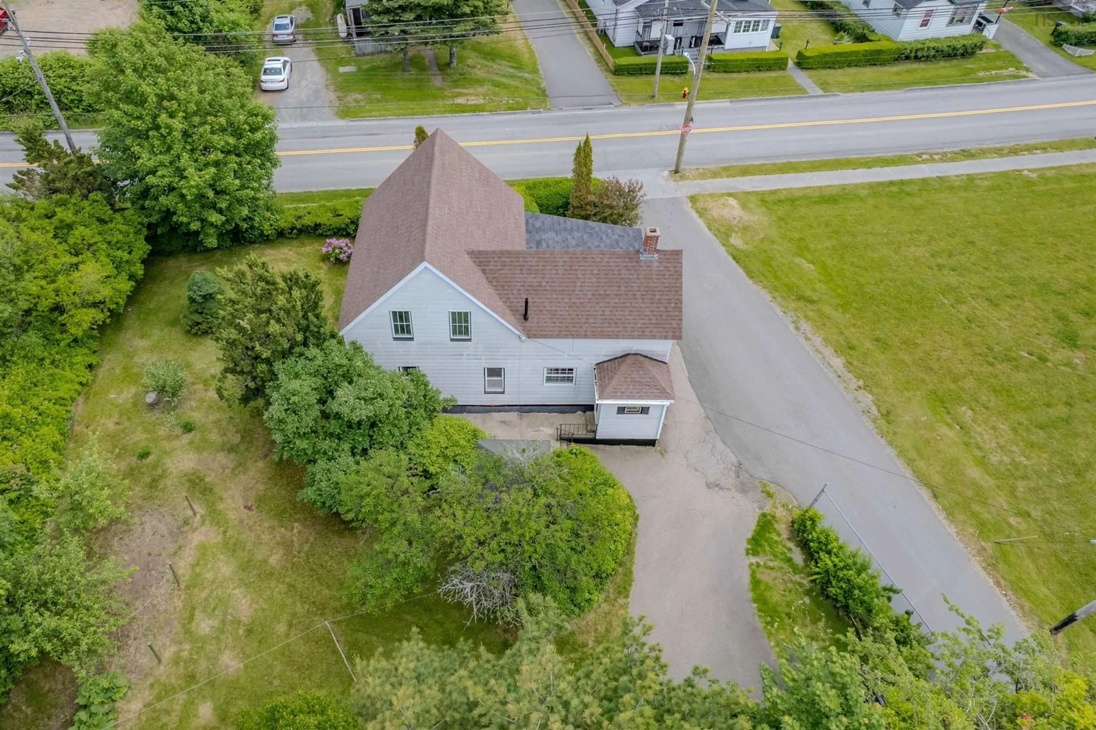 A pic from outside/outdoor area/front of a property/back of a property/a pic from drone, street for 187 Lingan Rd, Sydney Nova Scotia B1N 1V7