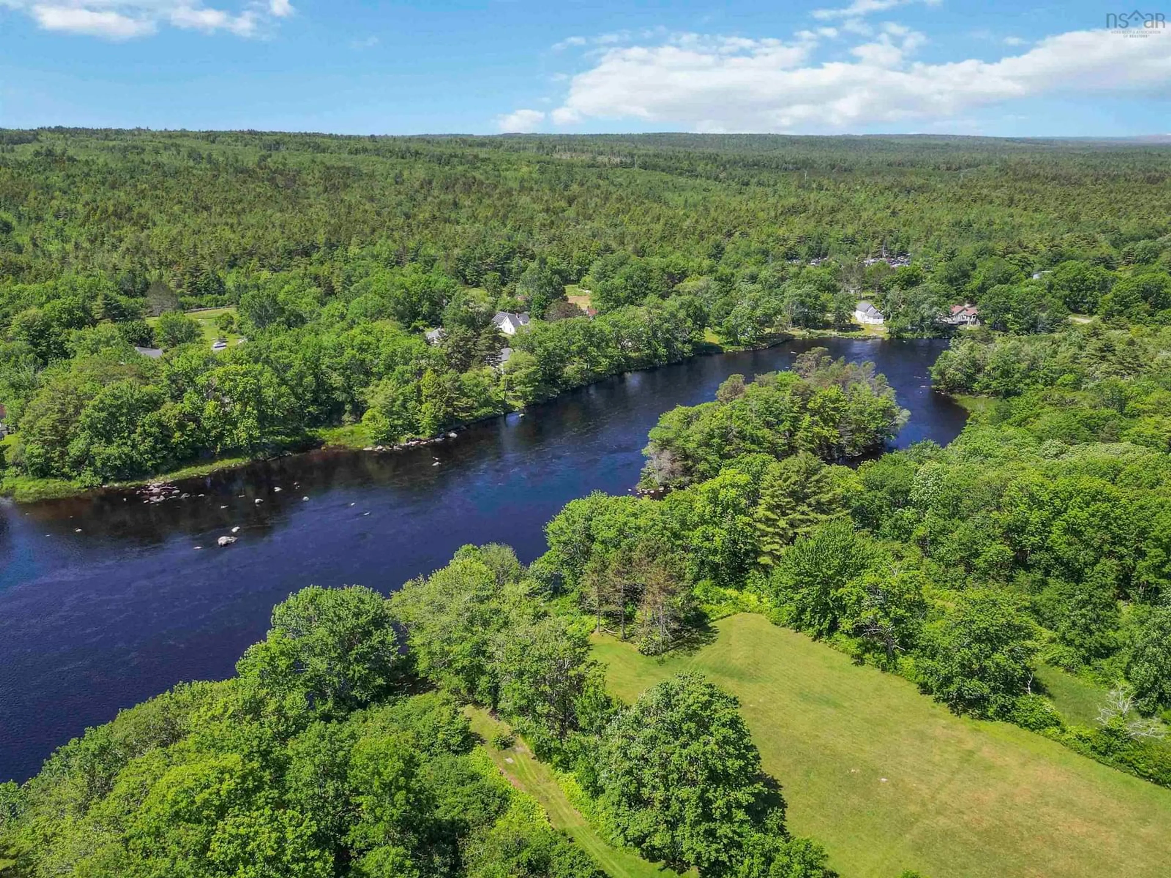 A pic from outside/outdoor area/front of a property/back of a property/a pic from drone, water/lake/river/ocean view for 420 8 Hwy, Milton Nova Scotia B0T 1P0