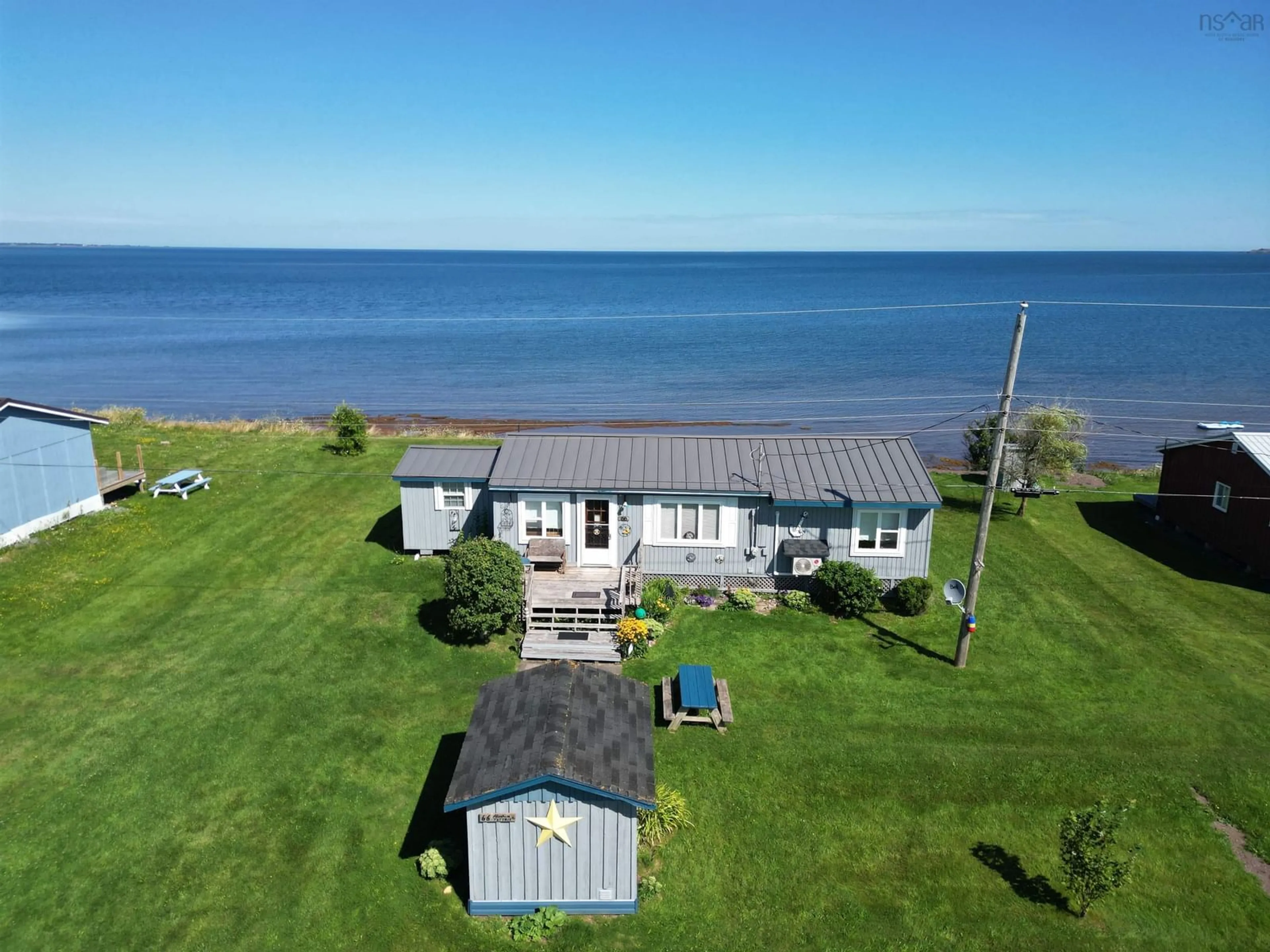 A pic from outside/outdoor area/front of a property/back of a property/a pic from drone, water/lake/river/ocean view for 66 Abram Tattrie Rd, Marshville Nova Scotia B0K 1N0