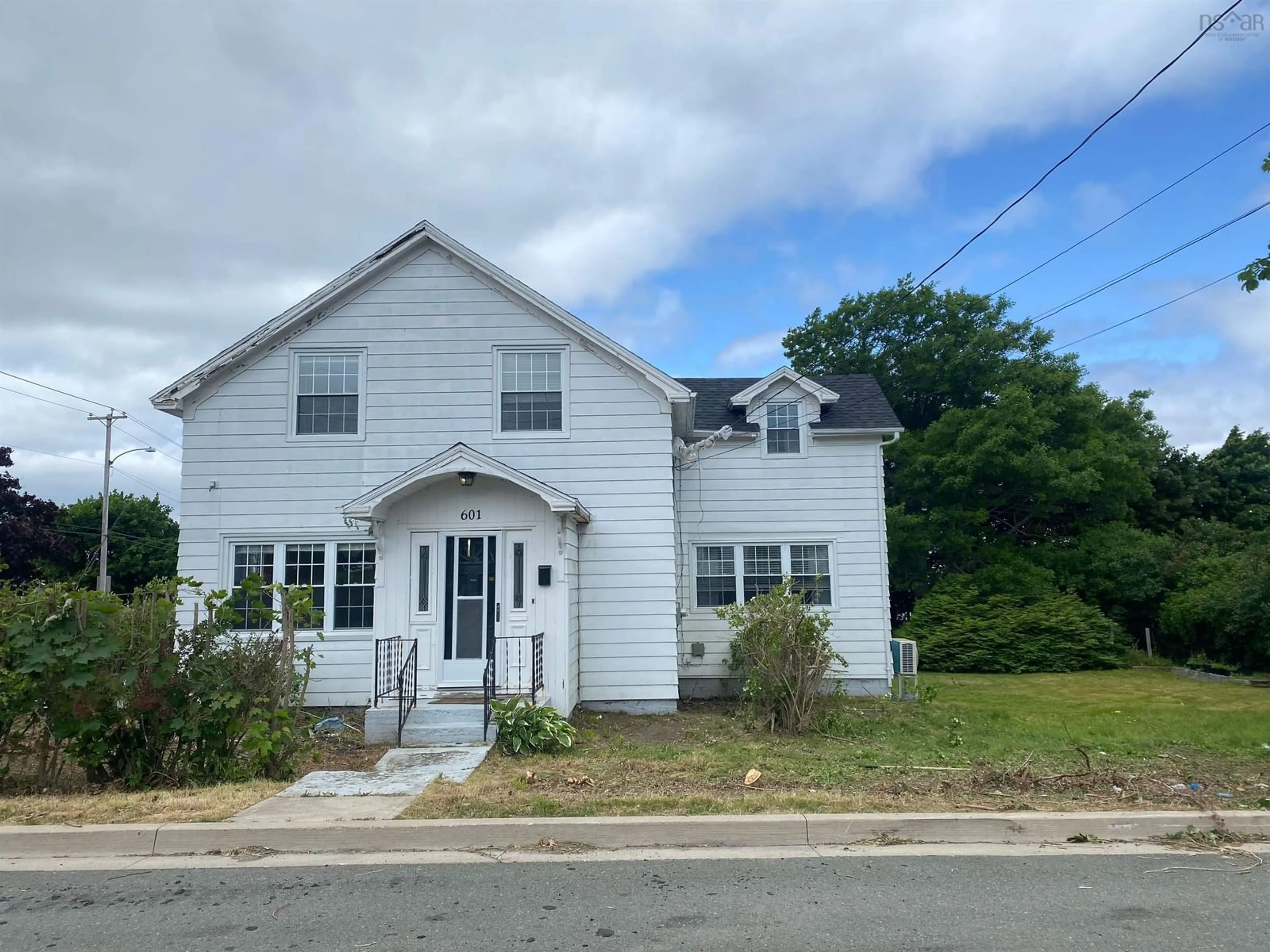 A pic from outside/outdoor area/front of a property/back of a property/a pic from drone, building for 601 George St, New Waterford Nova Scotia B1H 4E4