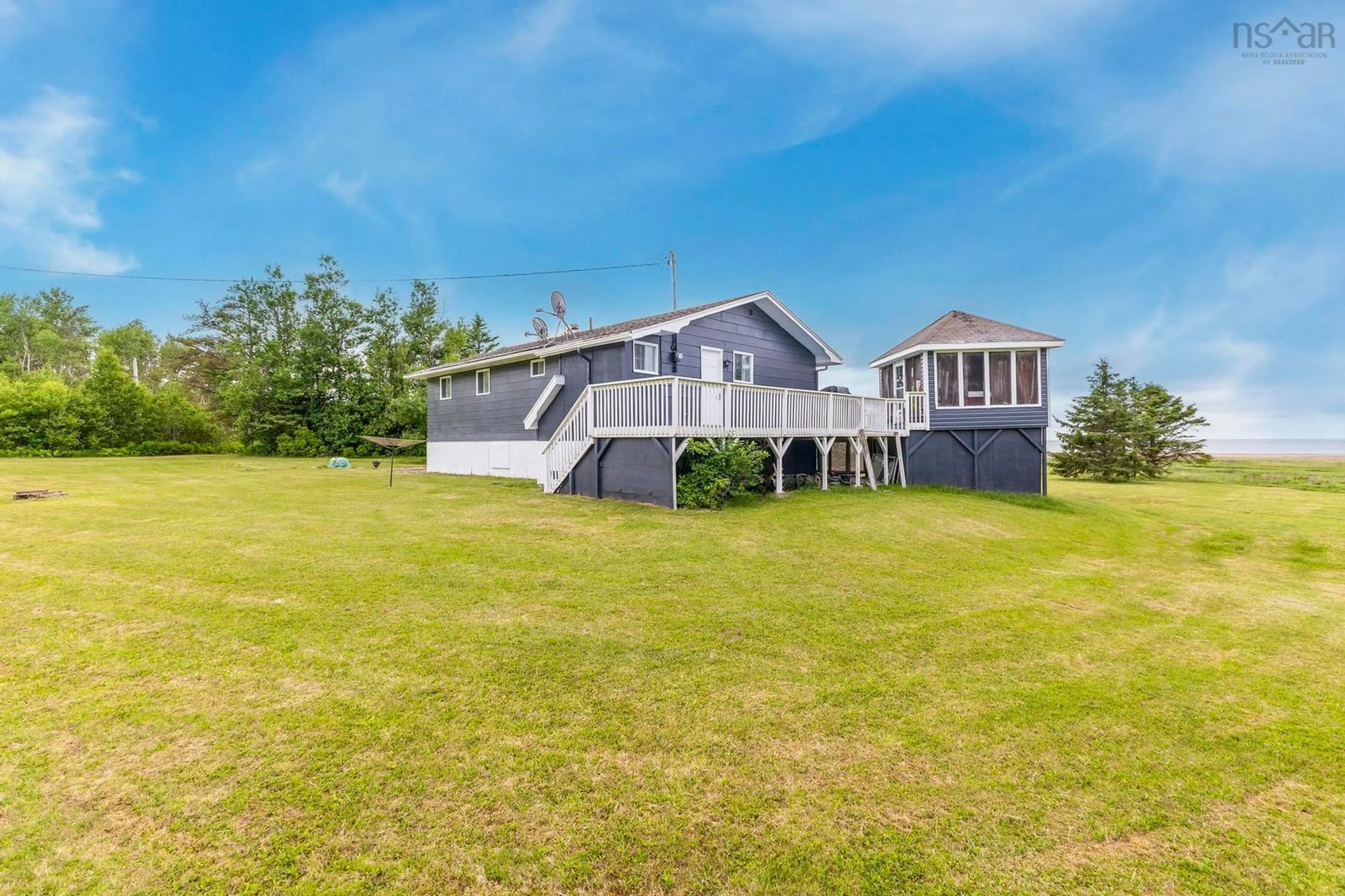 A pic from outside/outdoor area/front of a property/back of a property/a pic from drone, water/lake/river/ocean view for 7 Davies Road Branch, Malagash Mine Nova Scotia B0K 1E0